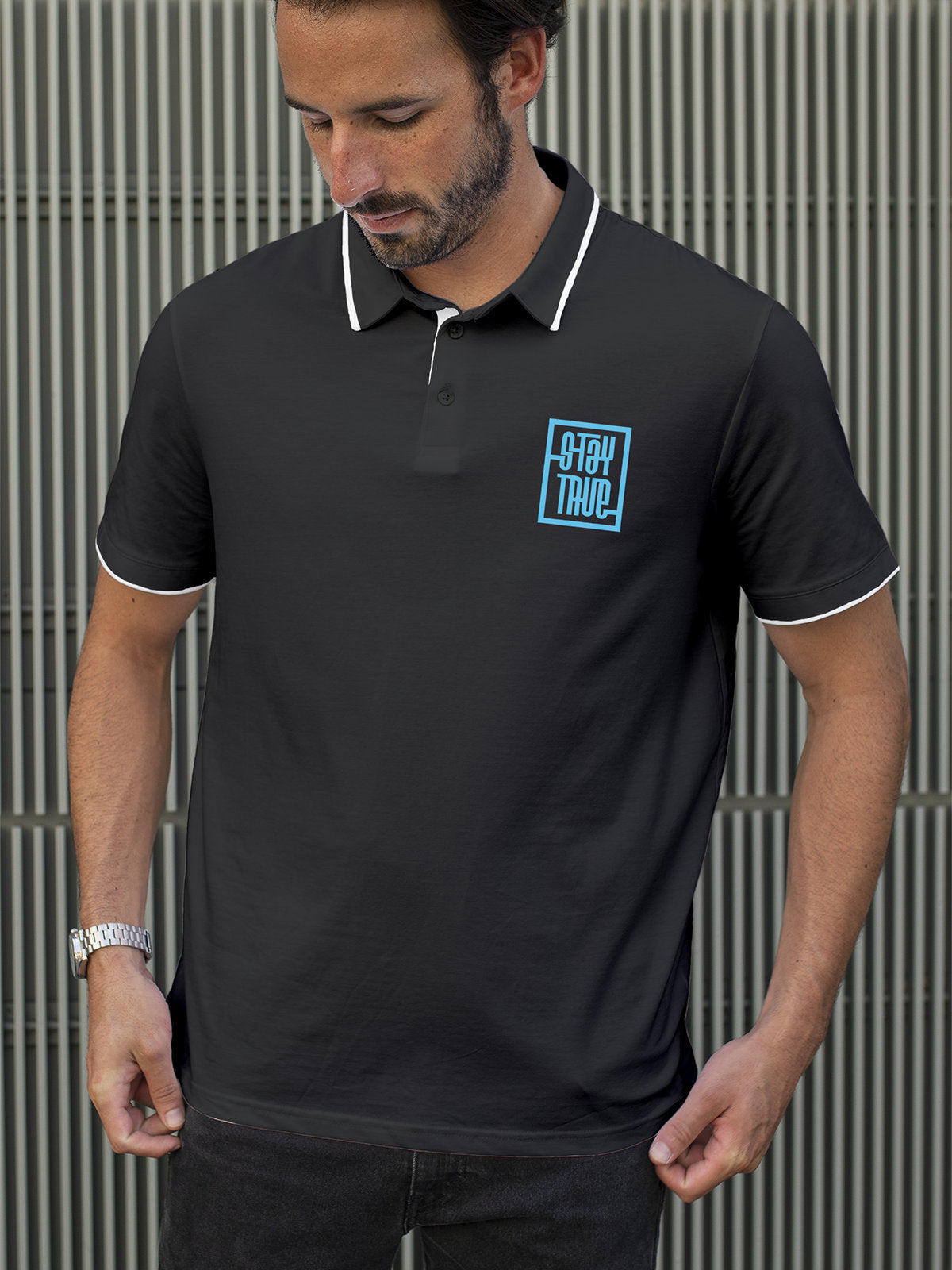 Model wearing Men's Dark Grey Polo T-shirt with Stay True, offering effortless style and premium comfort