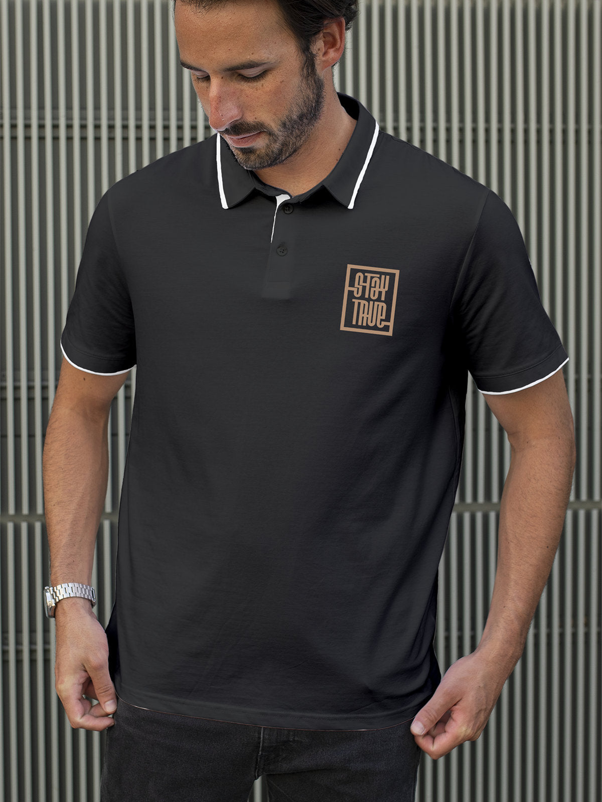 Model wearing Men's Dark Grey Polo T-shirt with Stay True, offering effortless style and premium comfort