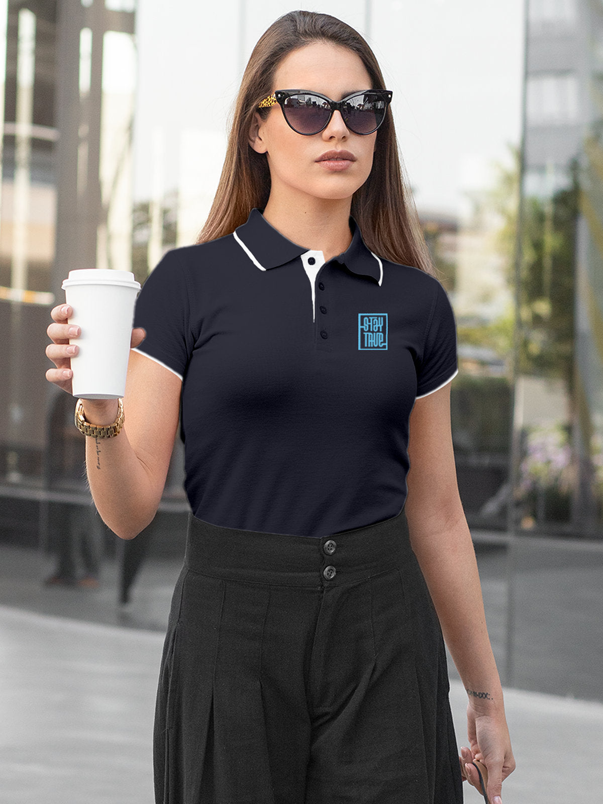 Model wearing Women's Navy Blue Polo T-shirt with Stay True, offering effortless style and premium comfort