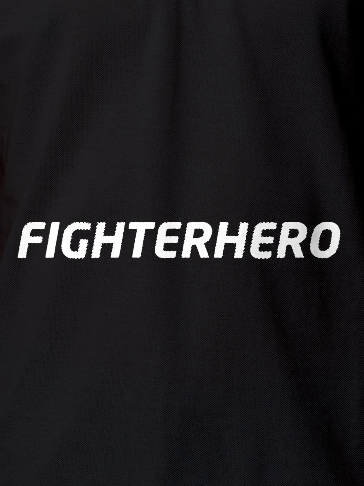 Close up of 'Fighterhero' design on Women's Dark Grey Polo T-shirt, highlighting intricate details and vibrant print.