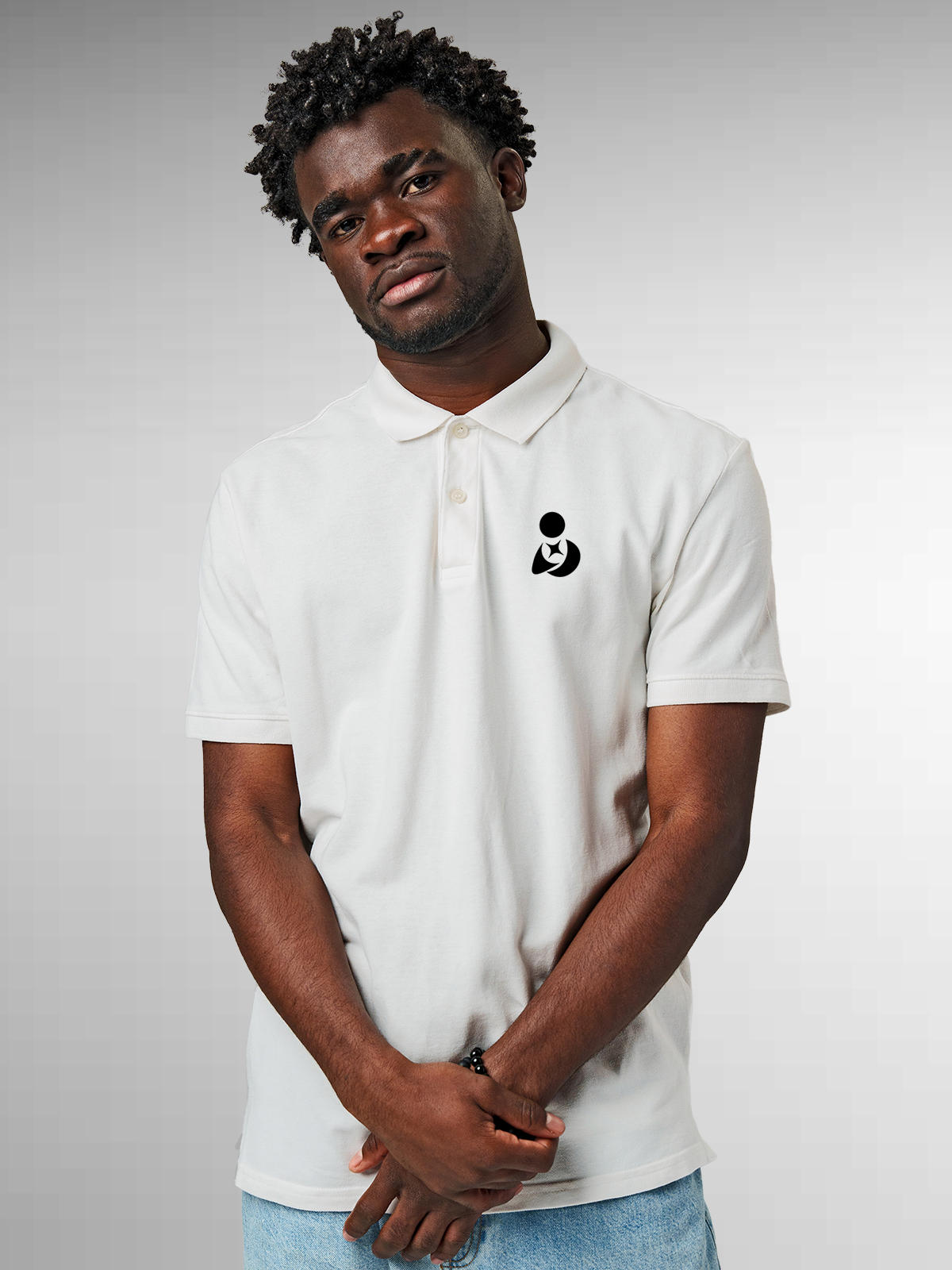 Model wearing Men's White Polo T-shirt with Fighterhero Logo, offering effortless style and premium comfort