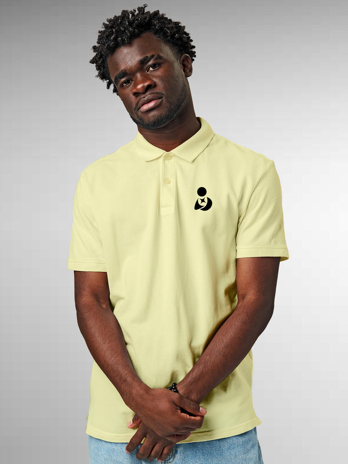 Model wearing Men's Yellow Polo T-shirt with Fighterhero Logo, offering effortless style and premium comfort