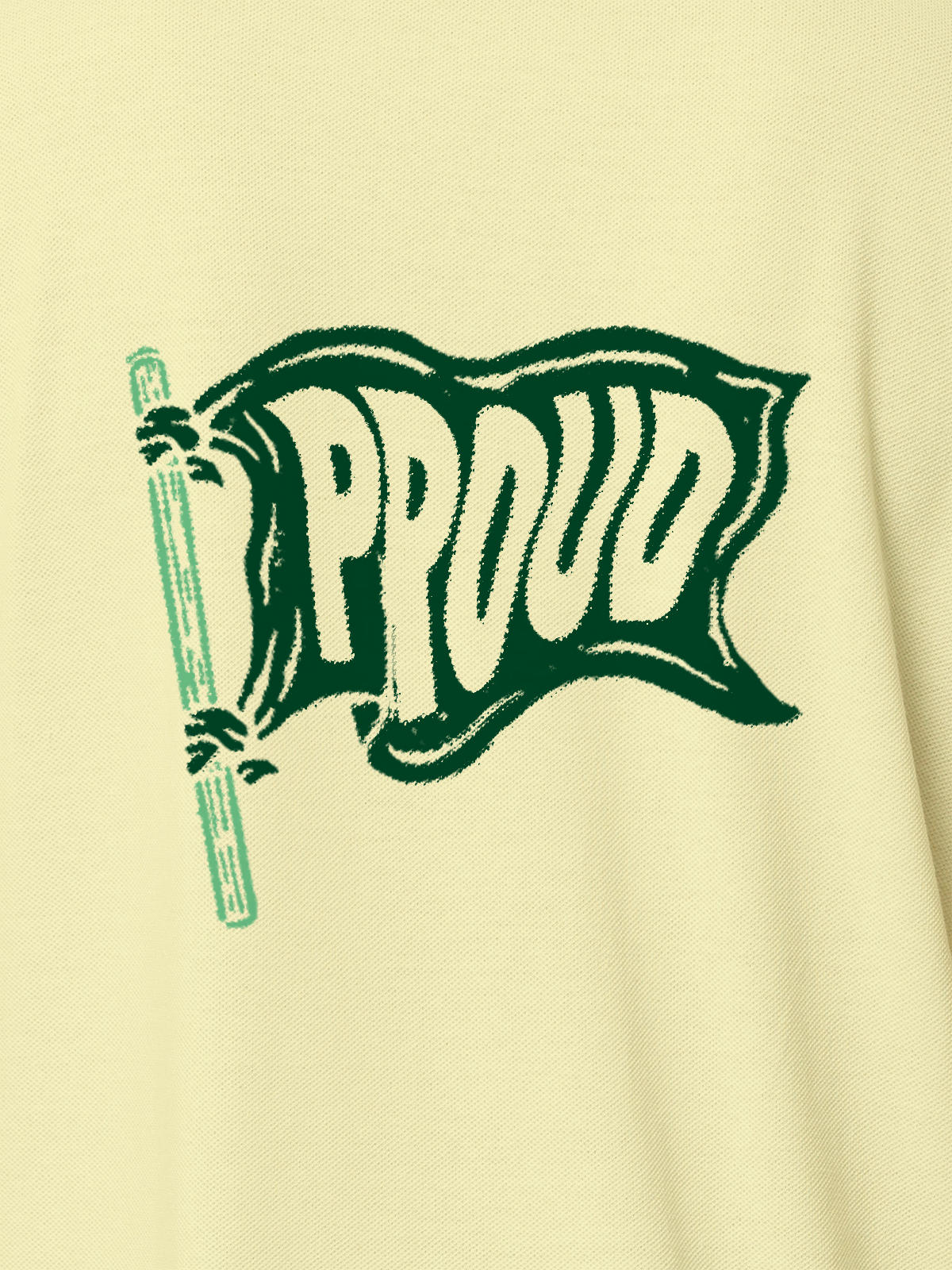 Close up of 'Proud' design on Men's Yellow Polo T-shirt, highlighting intricate details and vibrant print.