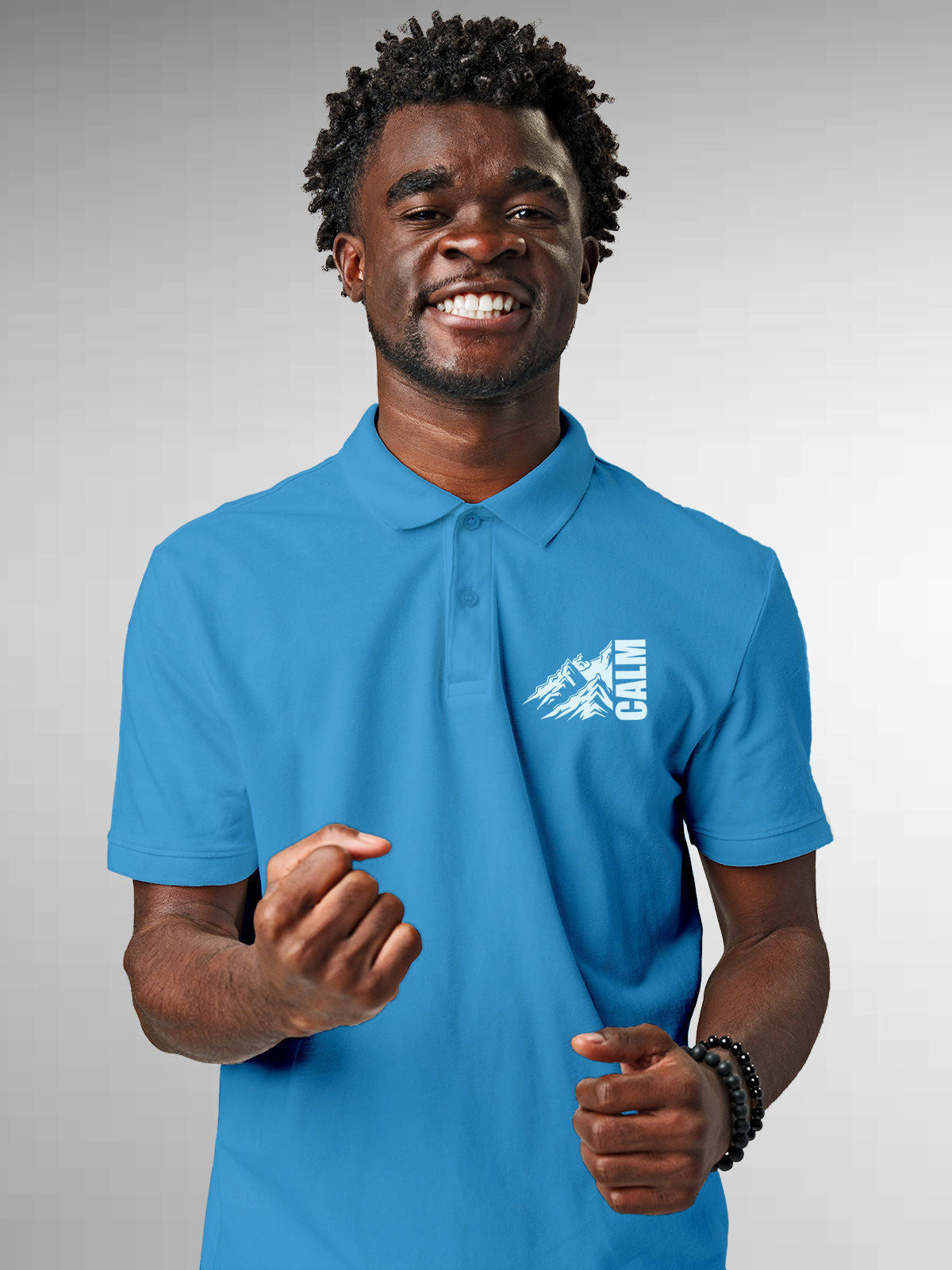 Model wearing Men's Blue Polo T-shirt with 'Calm' design, offering effortless style and premium comfort