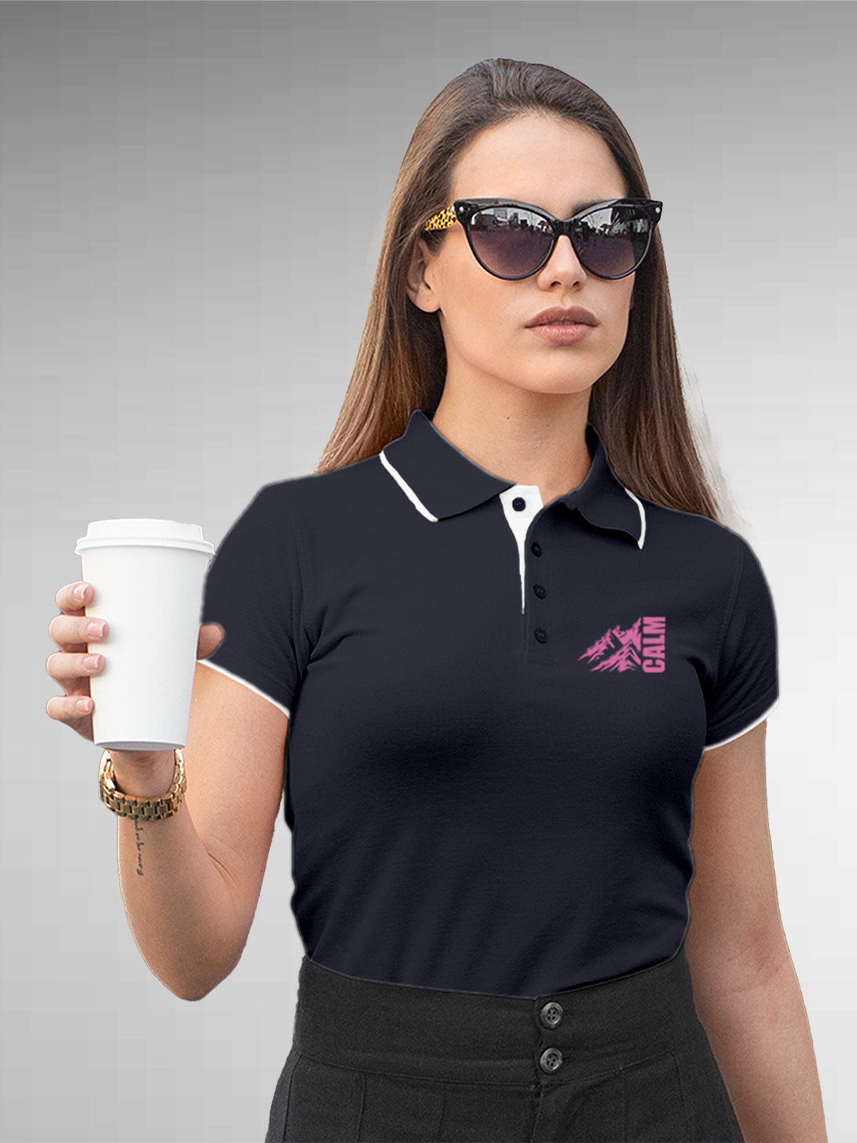 Model wearing Women's Navy Blue Polo T-shirt with 'Calm' design, offering effortless style and premium comfort