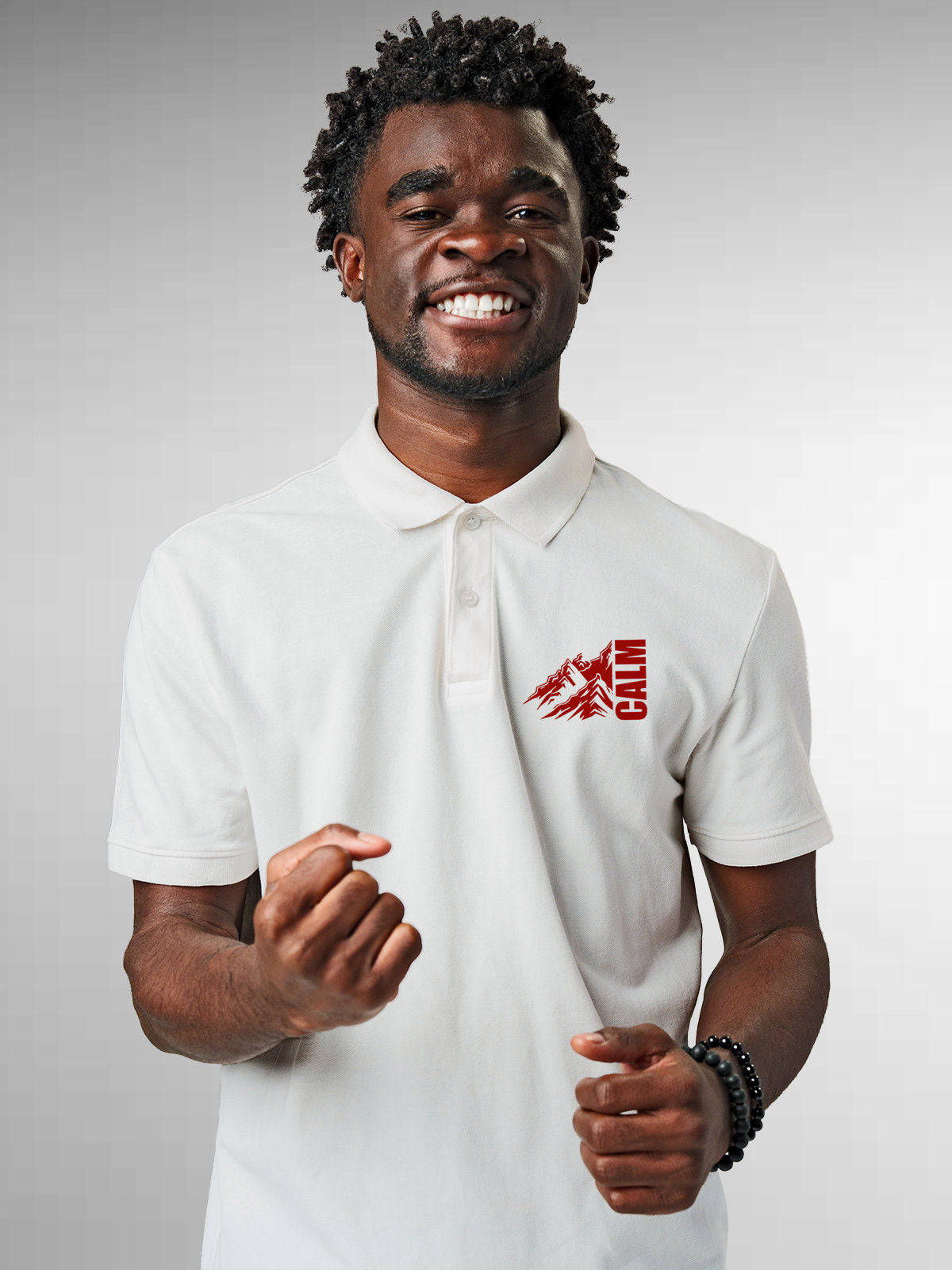 Model wearing Men's White Polo T-shirt with 'Calm' design, offering effortless style and premium comfort