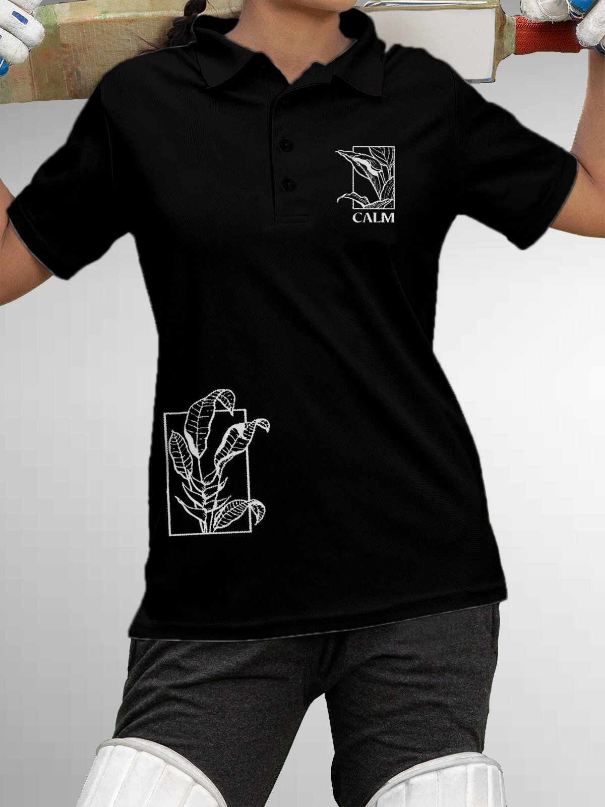 Model wearing Women's Black Polo T-shirt with 'Calm' design, offering effortless style and premium comfort