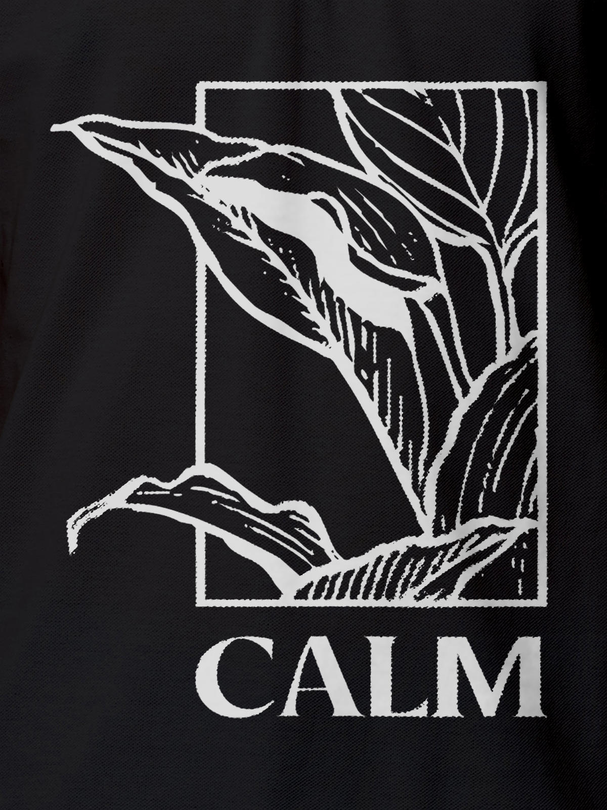 Close up of 'Calm' design on Men's Dark Grey Polo T-shirt, highlighting intricate details and vibrant print.