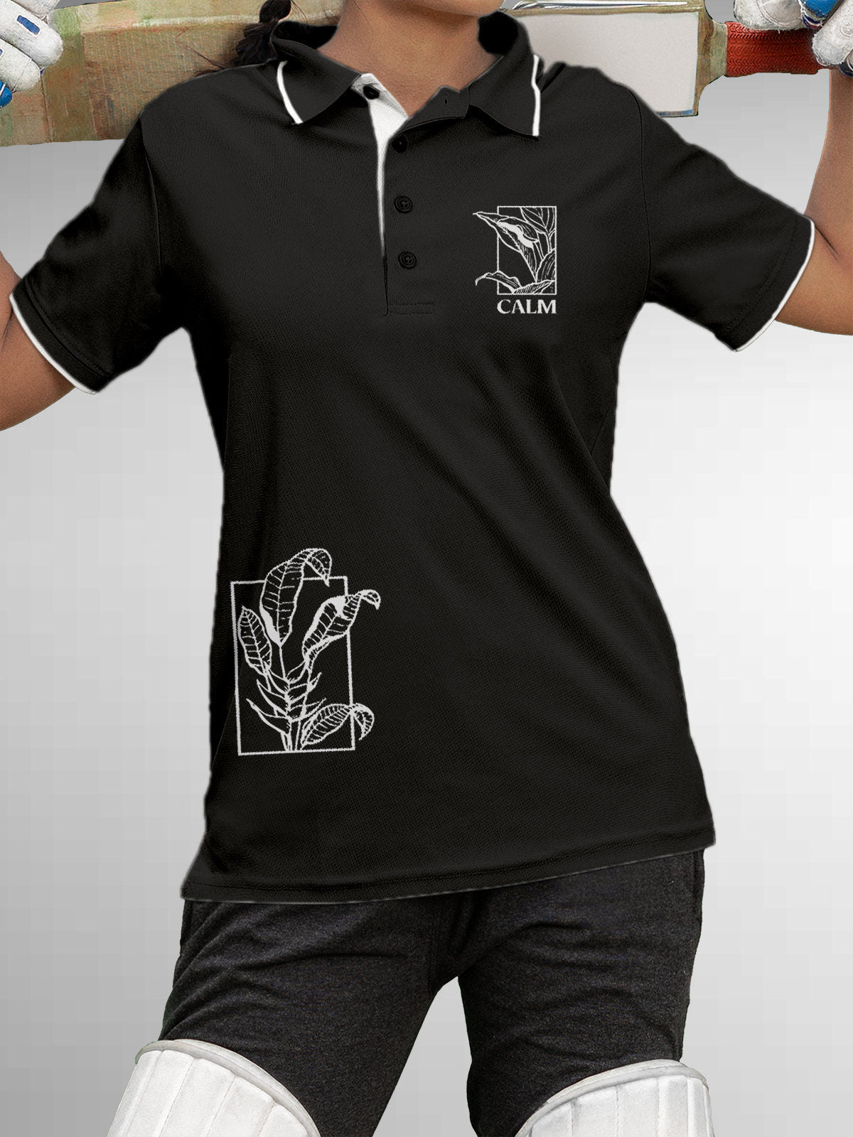 Model wearing Women's Dark Grey Polo T-shirt with 'Calm' design, offering effortless style and premium comfort