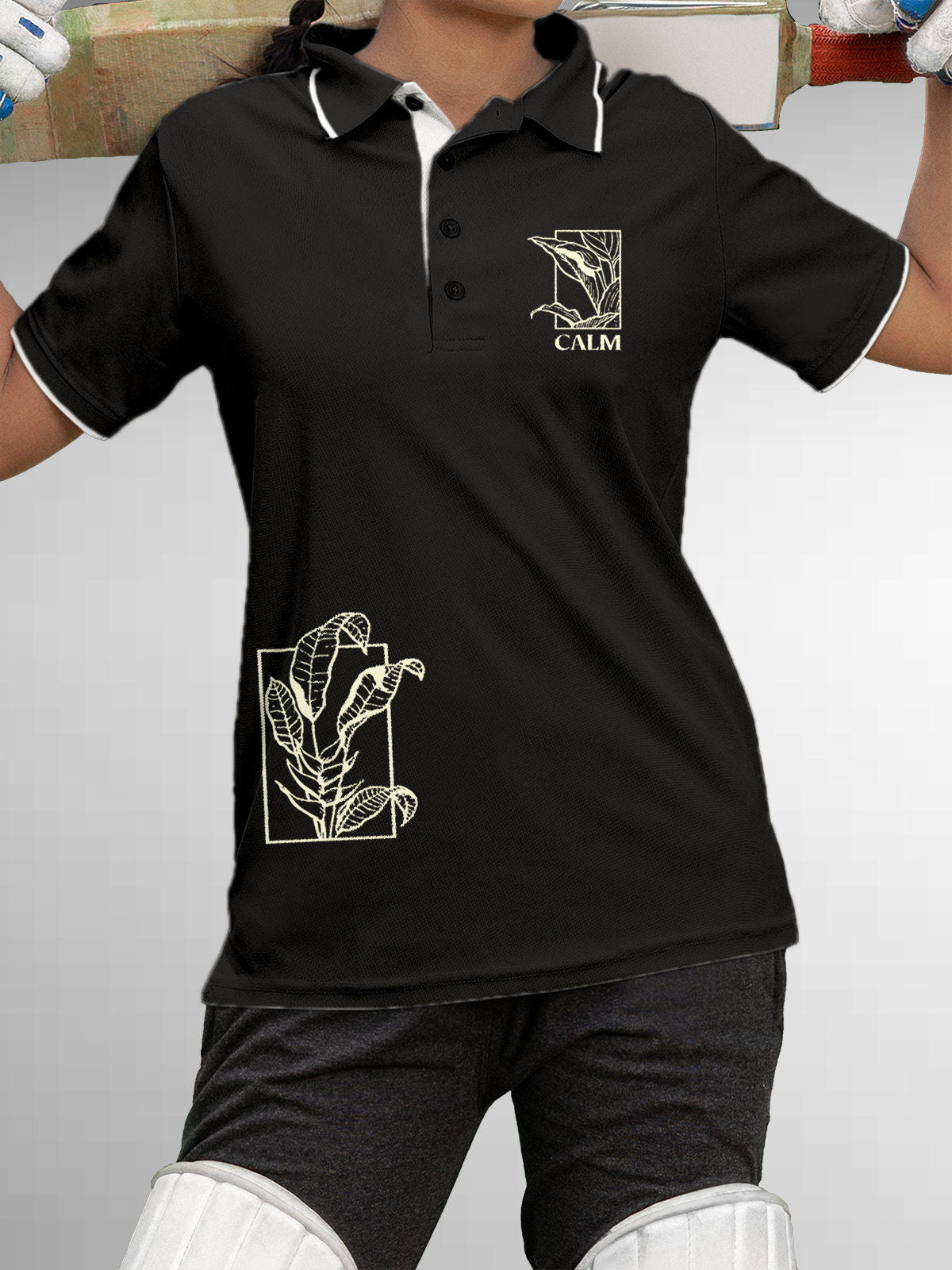 Model wearing Women's Dark Grey Polo T-shirt with 'Calm' design, offering effortless style and premium comfort