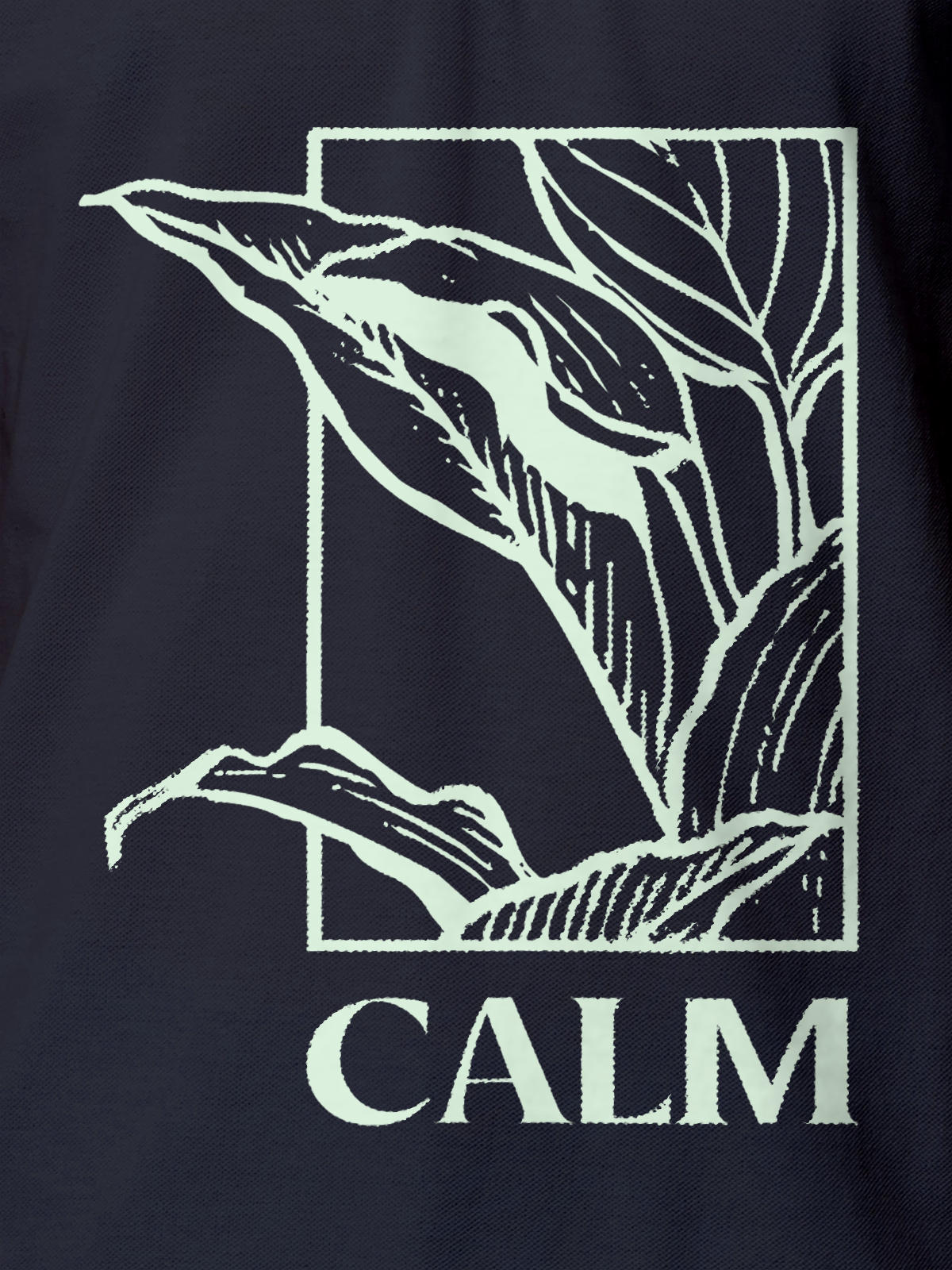 Close up of 'Calm' design on Men's Navy Blue Polo T-shirt, highlighting intricate details and vibrant print.