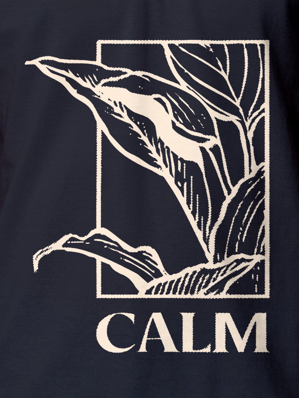Close up of 'Calm' design on Men's Navy Blue Polo T-shirt, highlighting intricate details and vibrant print.