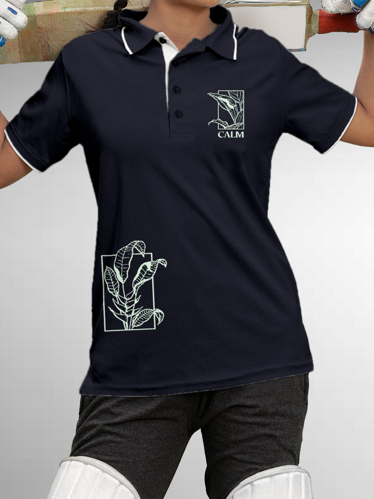 Model wearing Women's Navy Blue Polo T-shirt with 'Calm' design, offering effortless style and premium comfort