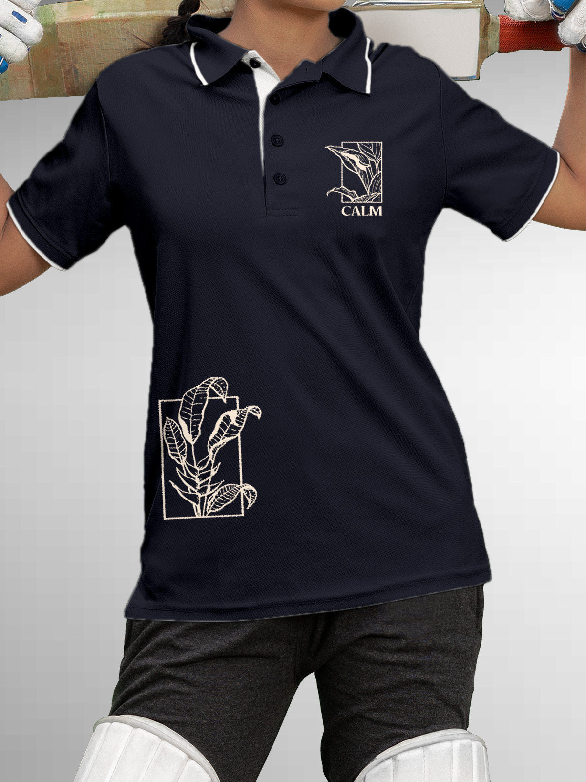 Model wearing Women's Navy Blue Polo T-shirt with 'Calm' design, offering effortless style and premium comfort
