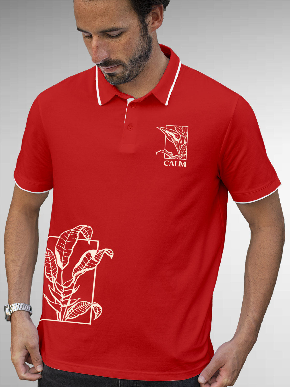 Model wearing Men's Red Polo T-shirt with 'Calm' design, offering effortless style and premium comfort