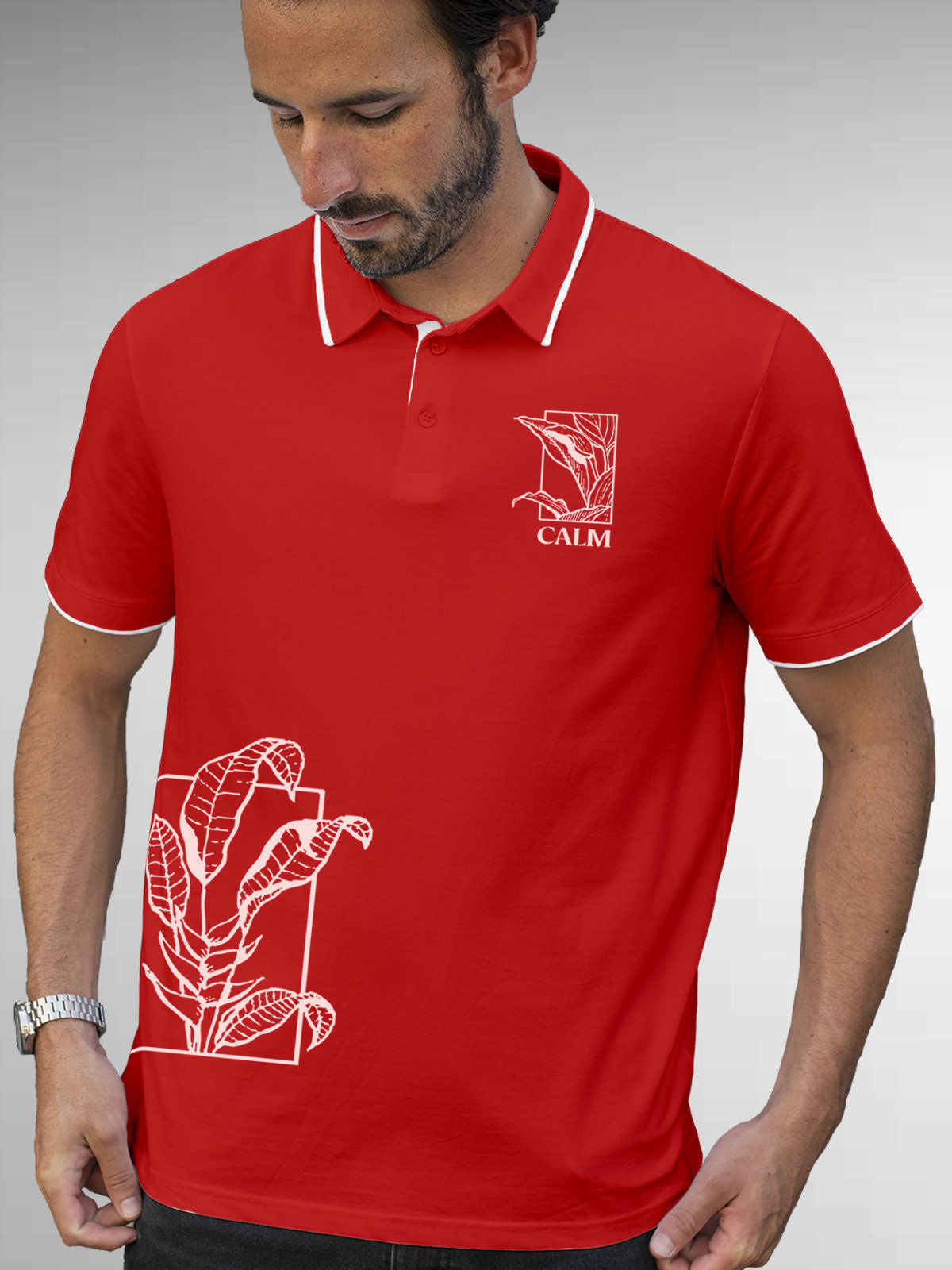Model wearing Men's Red Polo T-shirt with 'Calm' design, offering effortless style and premium comfort