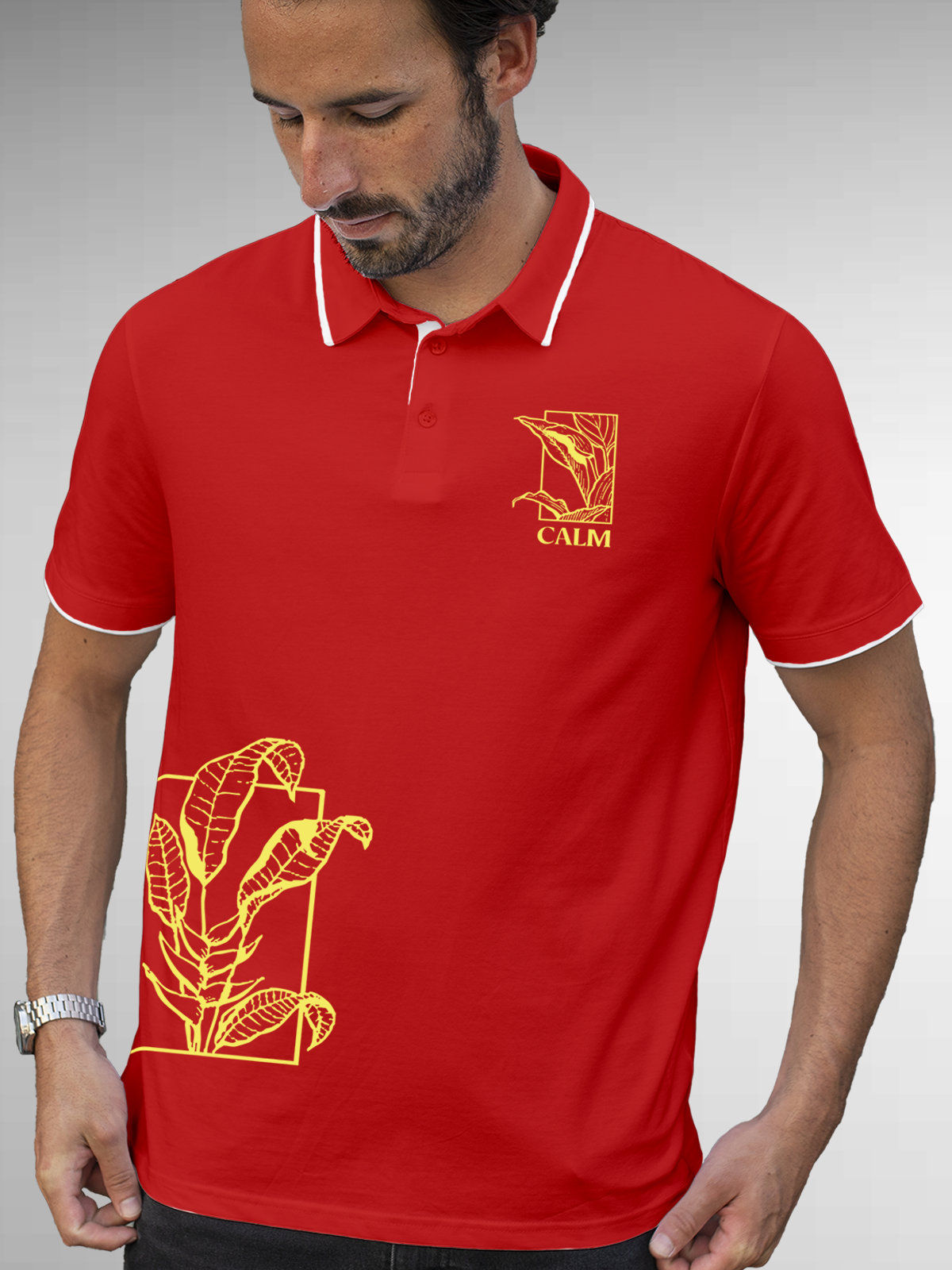 Model wearing Men's Red Polo T-shirt with 'Calm' design, offering effortless style and premium comfort