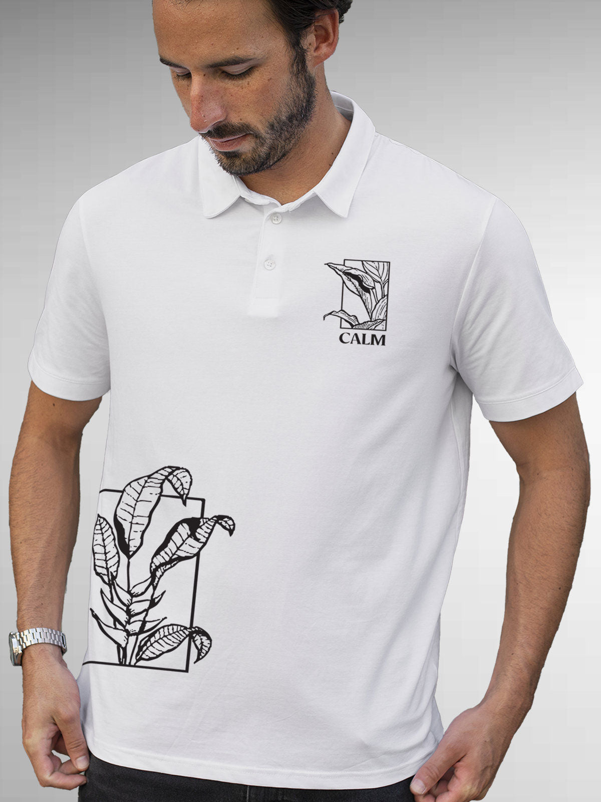 Model wearing Men's White Polo T-shirt with 'Calm' design, offering effortless style and premium comfort