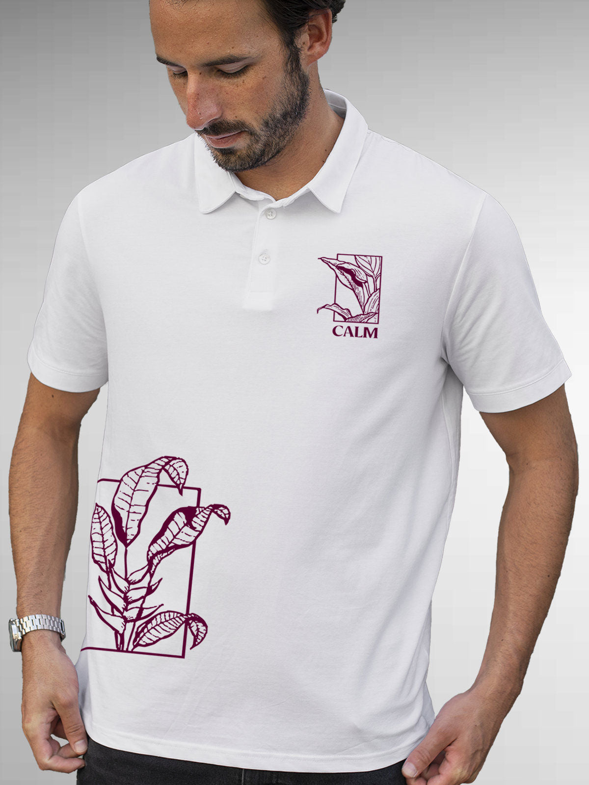 Model wearing Men's White Polo T-shirt with 'Calm' design, offering effortless style and premium comfort