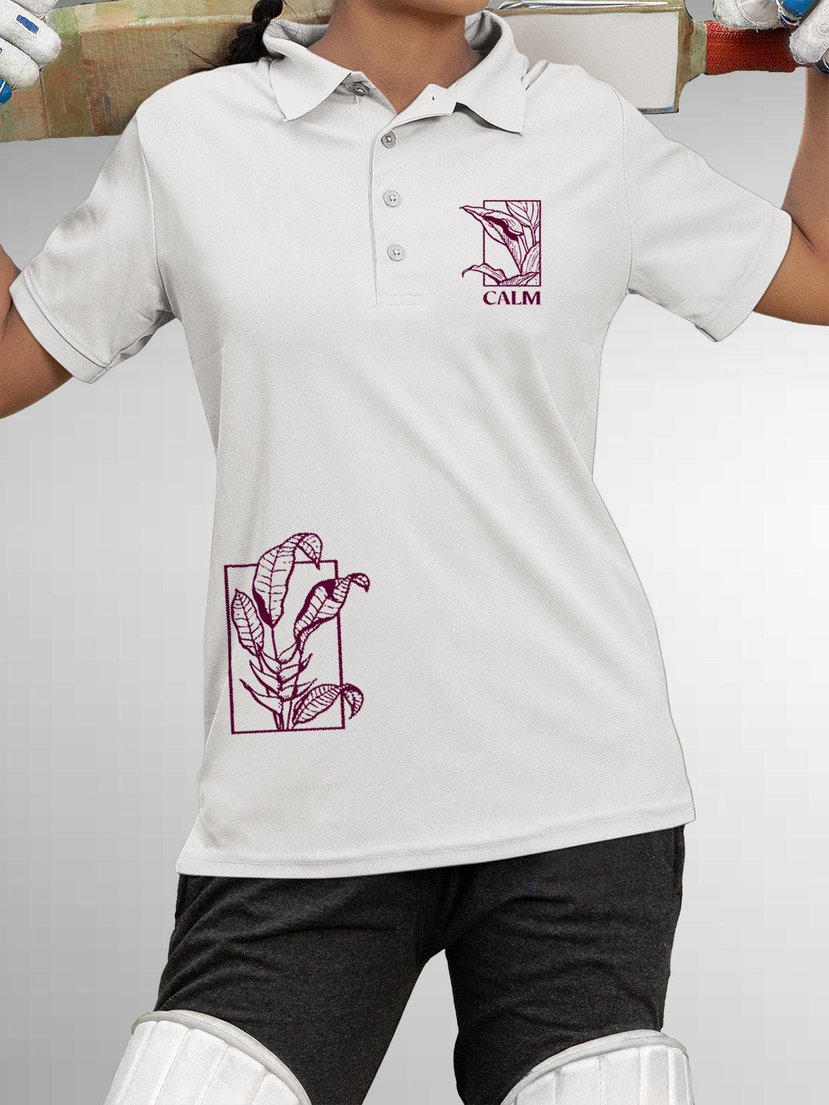 Model wearing Women's White Polo T-shirt with 'Calm' design, offering effortless style and premium comfort