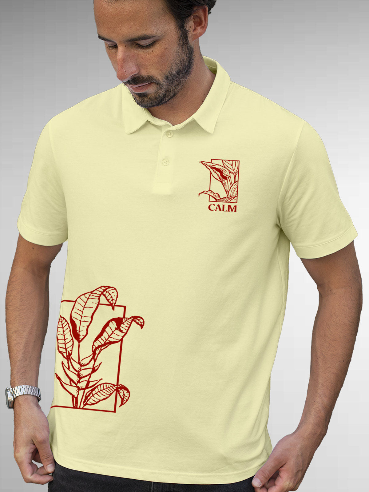 Model wearing Men's Yellow Polo T-shirt with 'Calm' design, offering effortless style and premium comfort