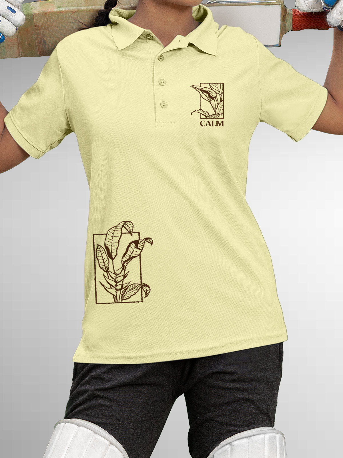 Model wearing Women's Yellow Polo T-shirt with 'Calm' design, offering effortless style and premium comfort