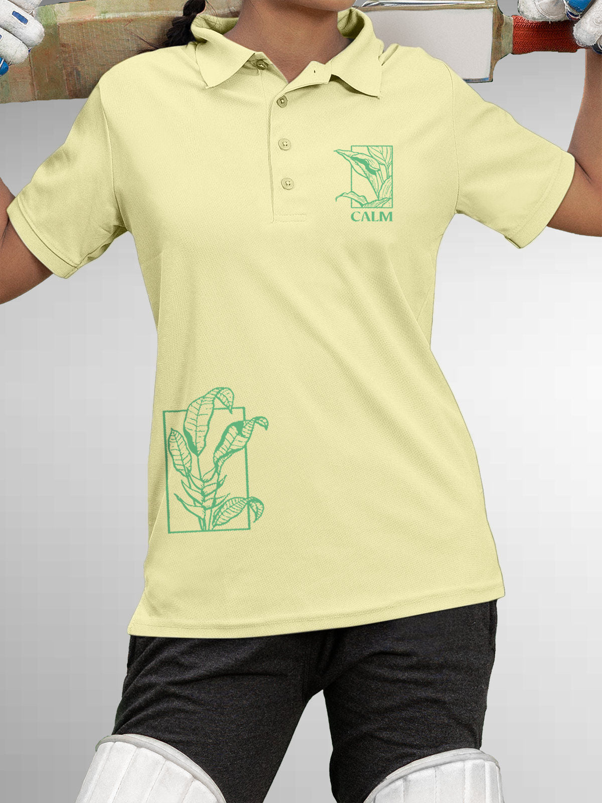 Model wearing Women's Yellow Polo T-shirt with 'Calm' design, offering effortless style and premium comfort