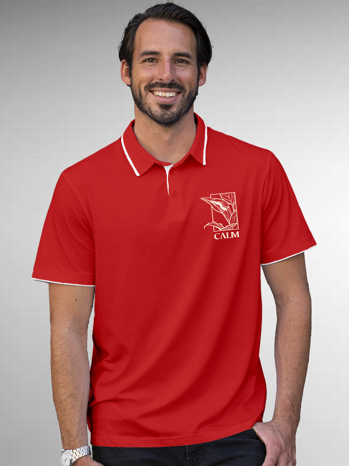 Model wearing Men's Red Polo T-shirt with 'Calm' design, offering effortless style and premium comfort
