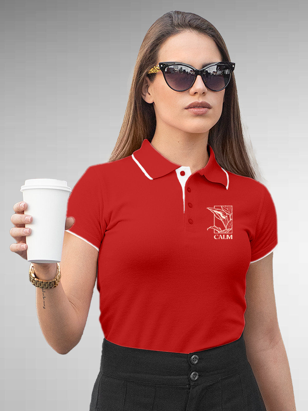 Model wearing Women's Red Polo T-shirt with 'Calm' design, offering effortless style and premium comfort