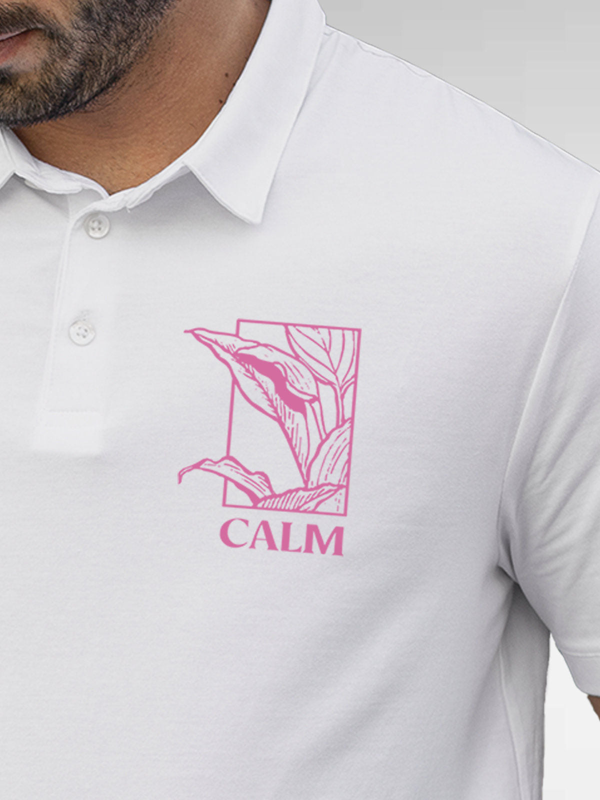 Close up of 'Calm' design on Men's White Polo T-shirt, highlighting intricate details and vibrant print.