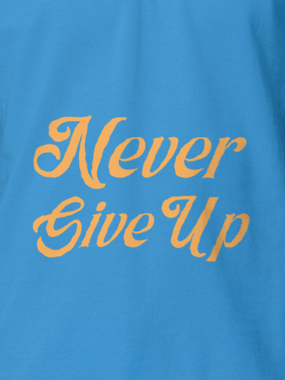Close up of 'Never Give Up' design on Men's Blue Polo T-shirt, highlighting intricate details and vibrant print.