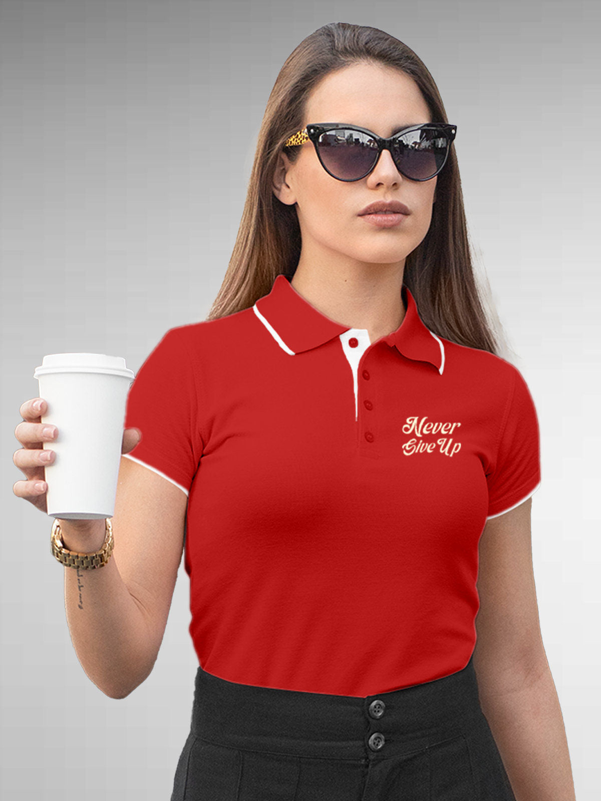 Model wearing Women's Red Polo T-shirt with 'Never Give Up' design, offering effortless style and premium comfort