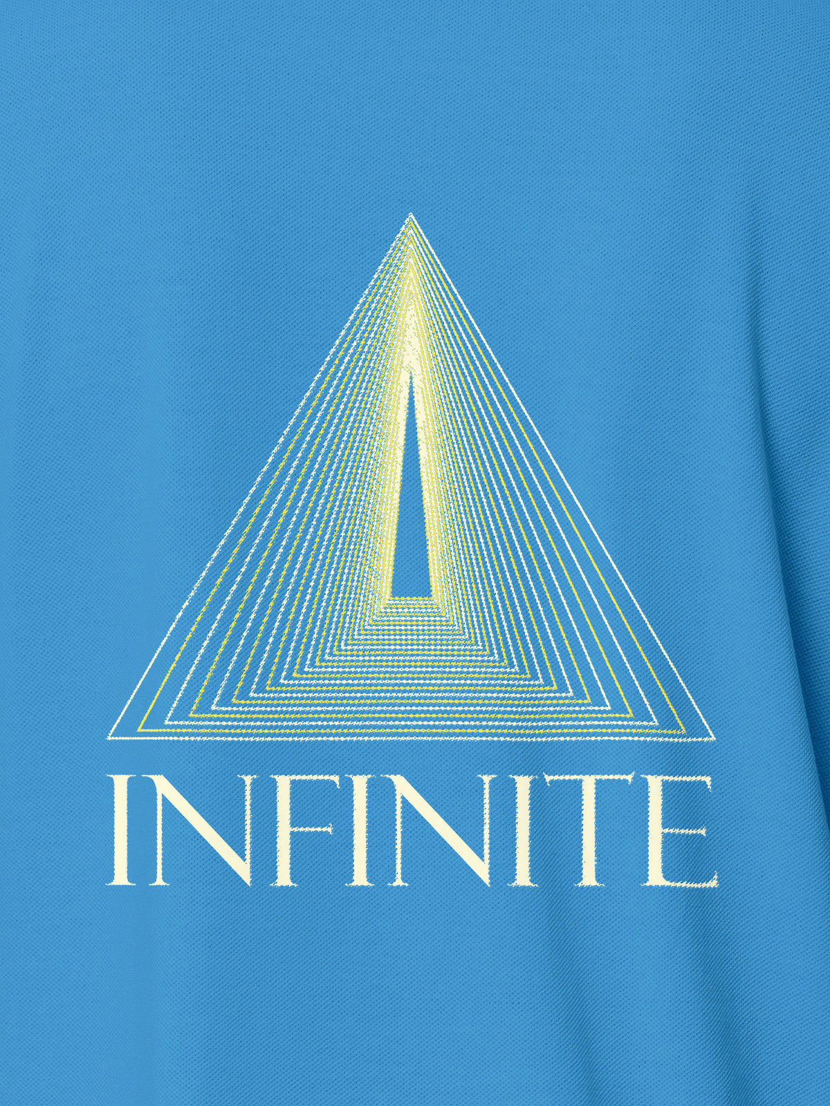 Close up of 'Go Infinite' design on Women's Blue Polo T-shirt, highlighting intricate details and vibrant print.