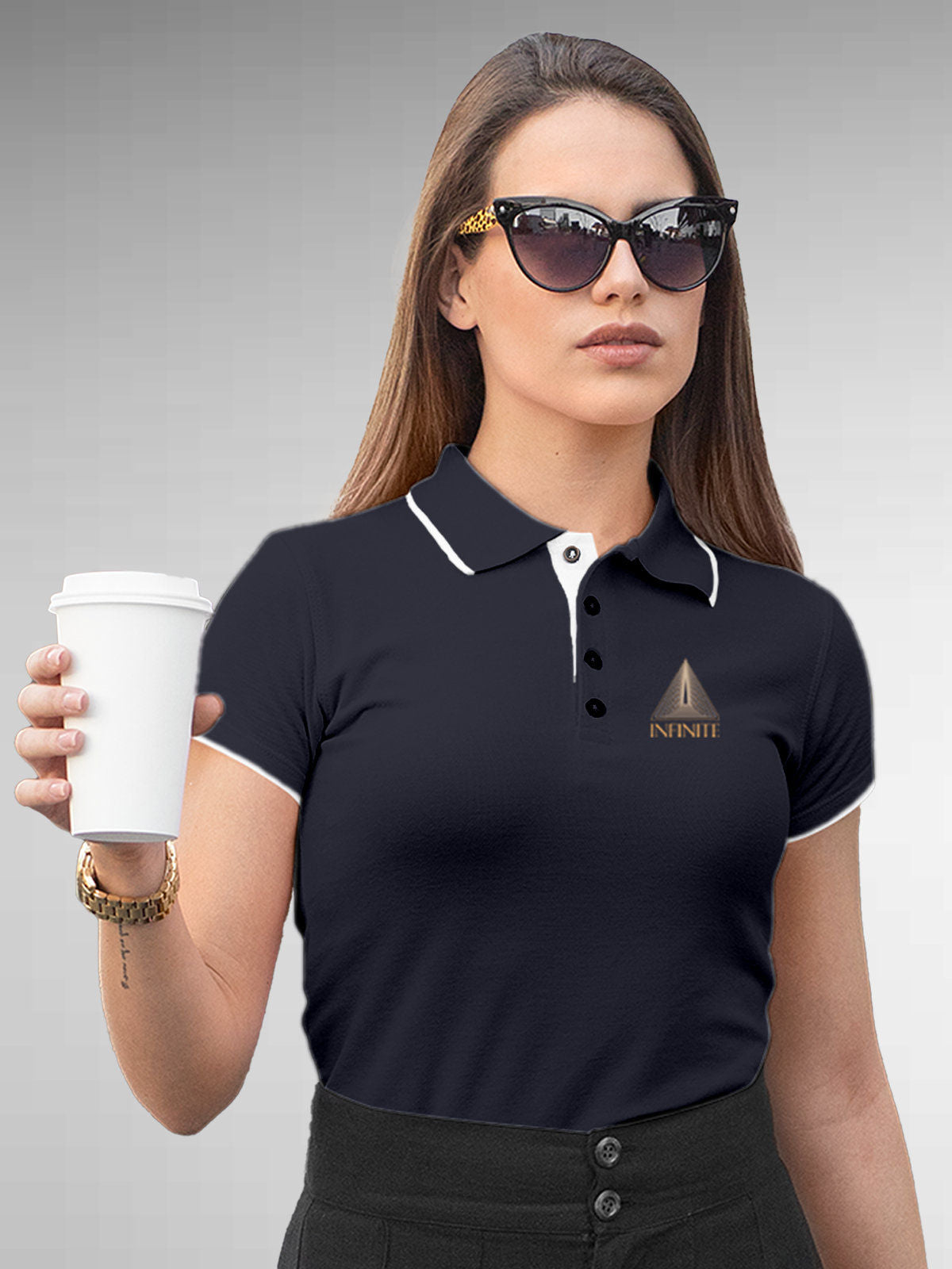 Model wearing Women's Navy Blue Polo T-shirt with 'Go Infinite' design, offering effortless style and premium comfort