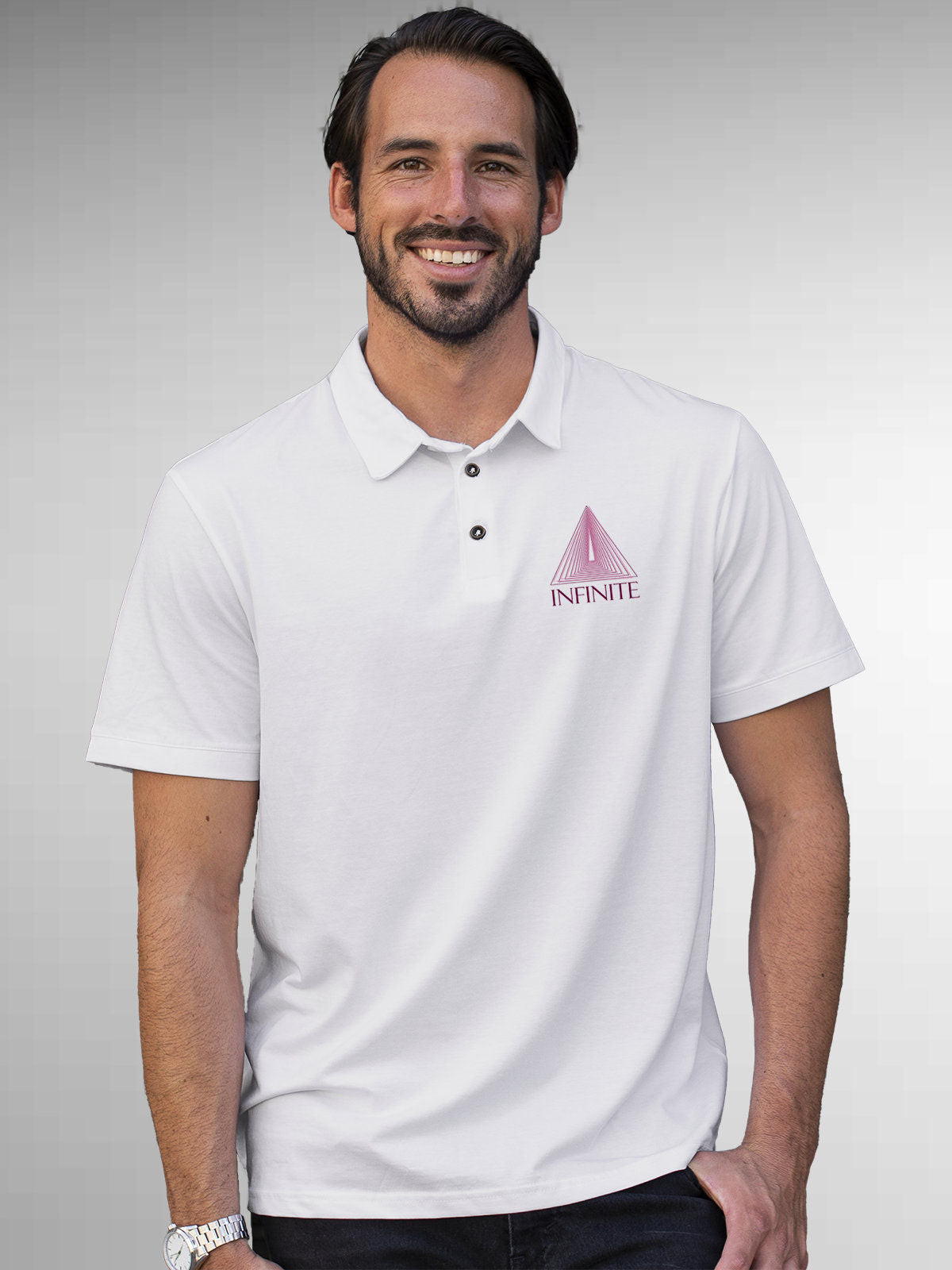 Model wearing Men's White Polo T-shirt with 'Go Infinite' design, offering effortless style and premium comfort