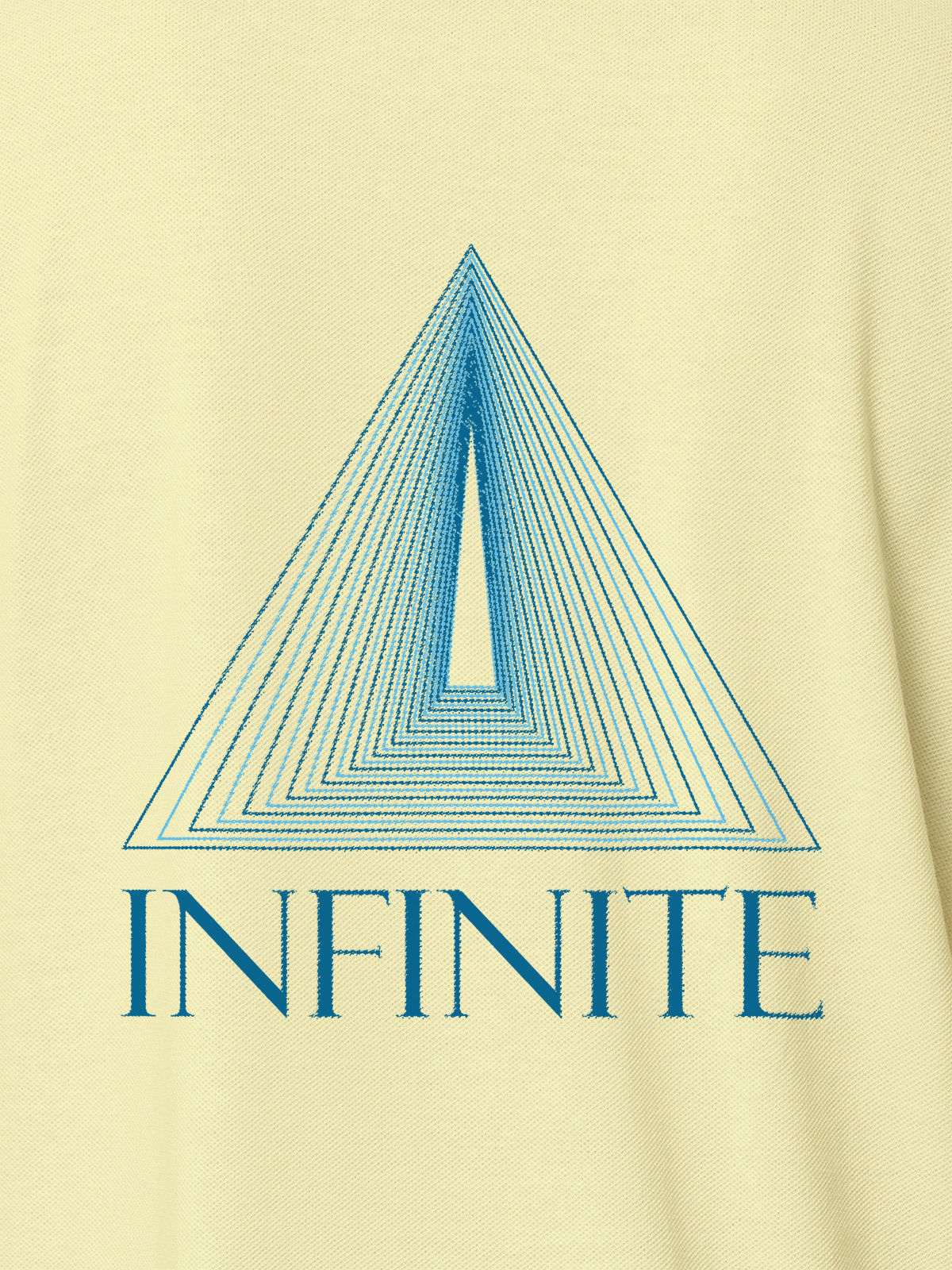 Close up of 'Go Infinite' design on Women's Yellow Polo T-shirt, highlighting intricate details and vibrant print.