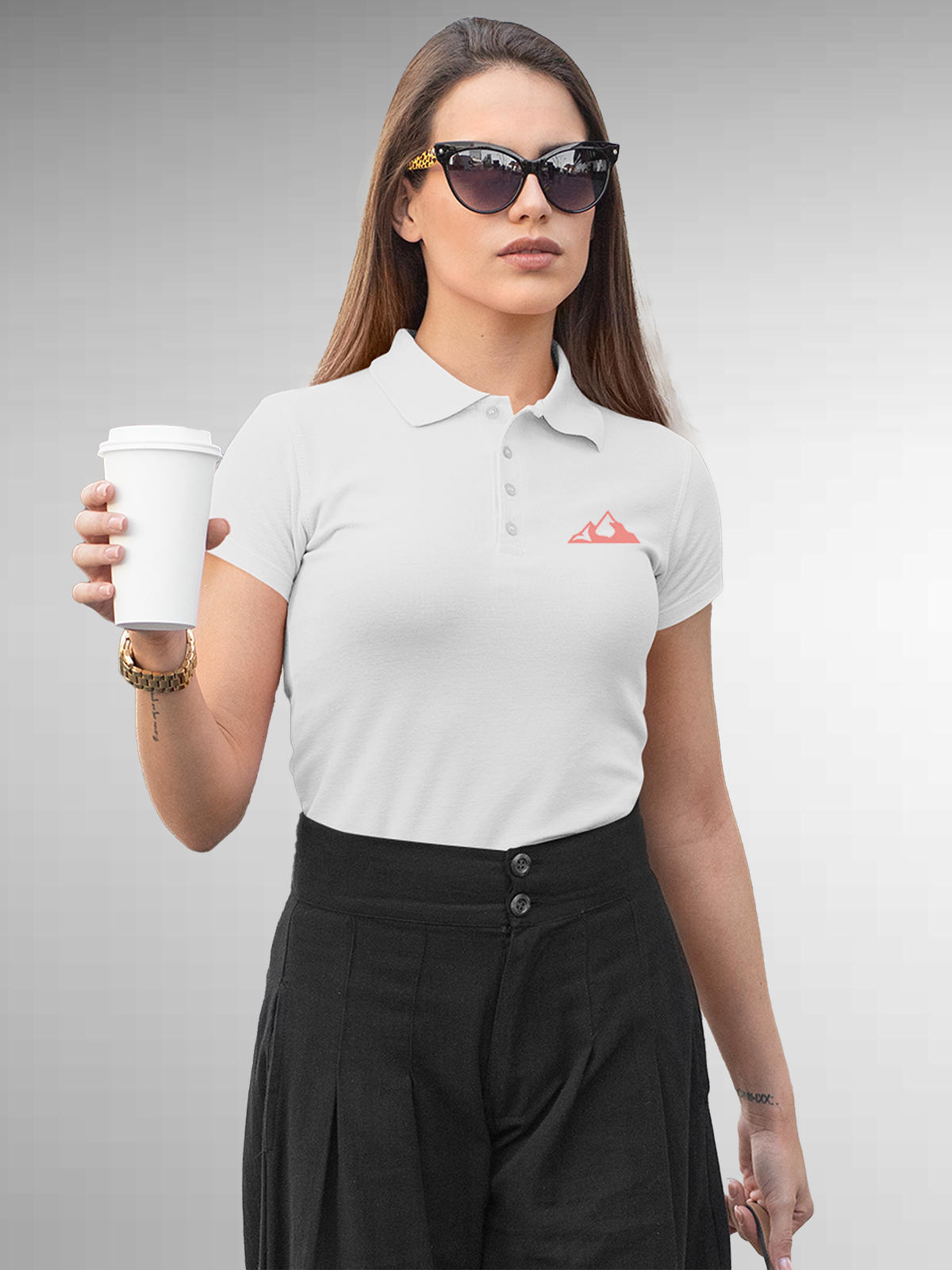 Model wearing Women's White Polo T-shirt with 'Grit' design, offering effortless style and premium comfort