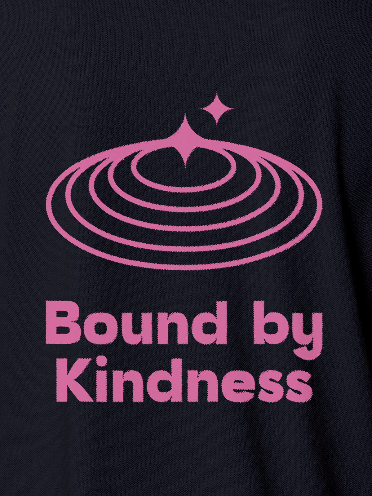 Close up of 'Bound By Kindness' design on Women's Navy Blue Polo T-shirt, highlighting intricate details and vibrant print.