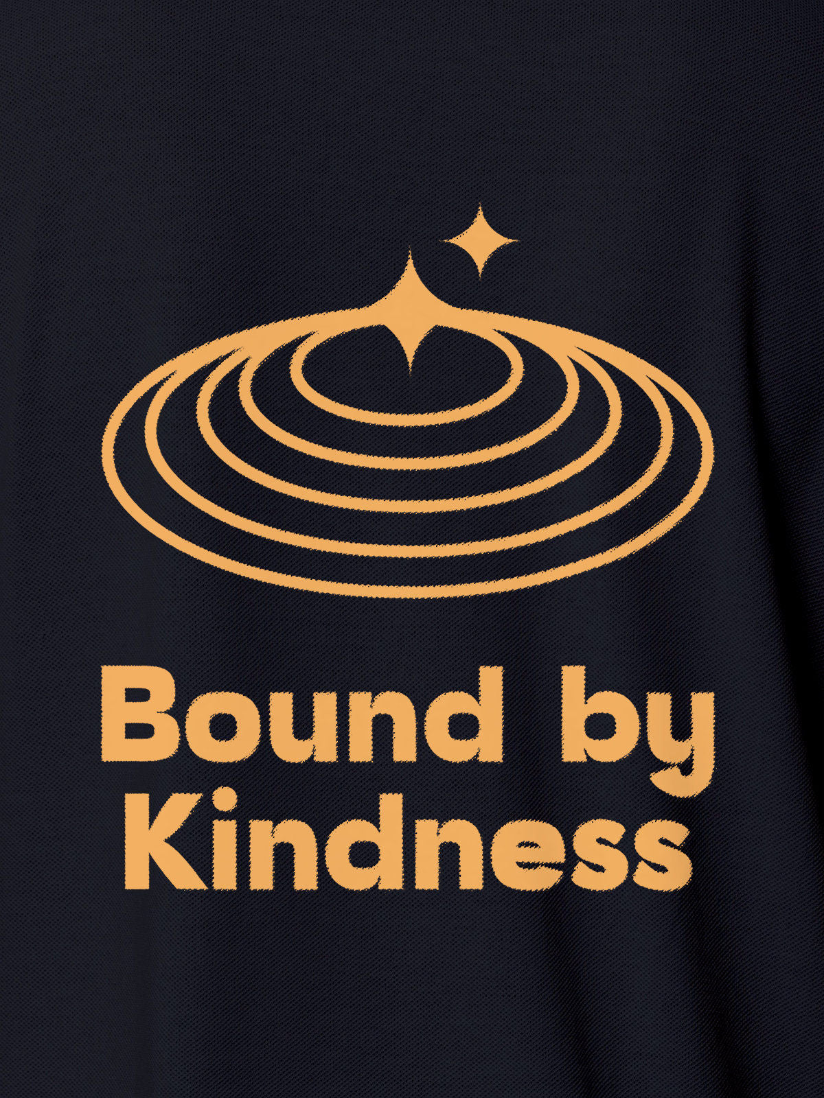 Close up of 'Bound By Kindness' design on Women's Navy Blue Polo T-shirt, highlighting intricate details and vibrant print.