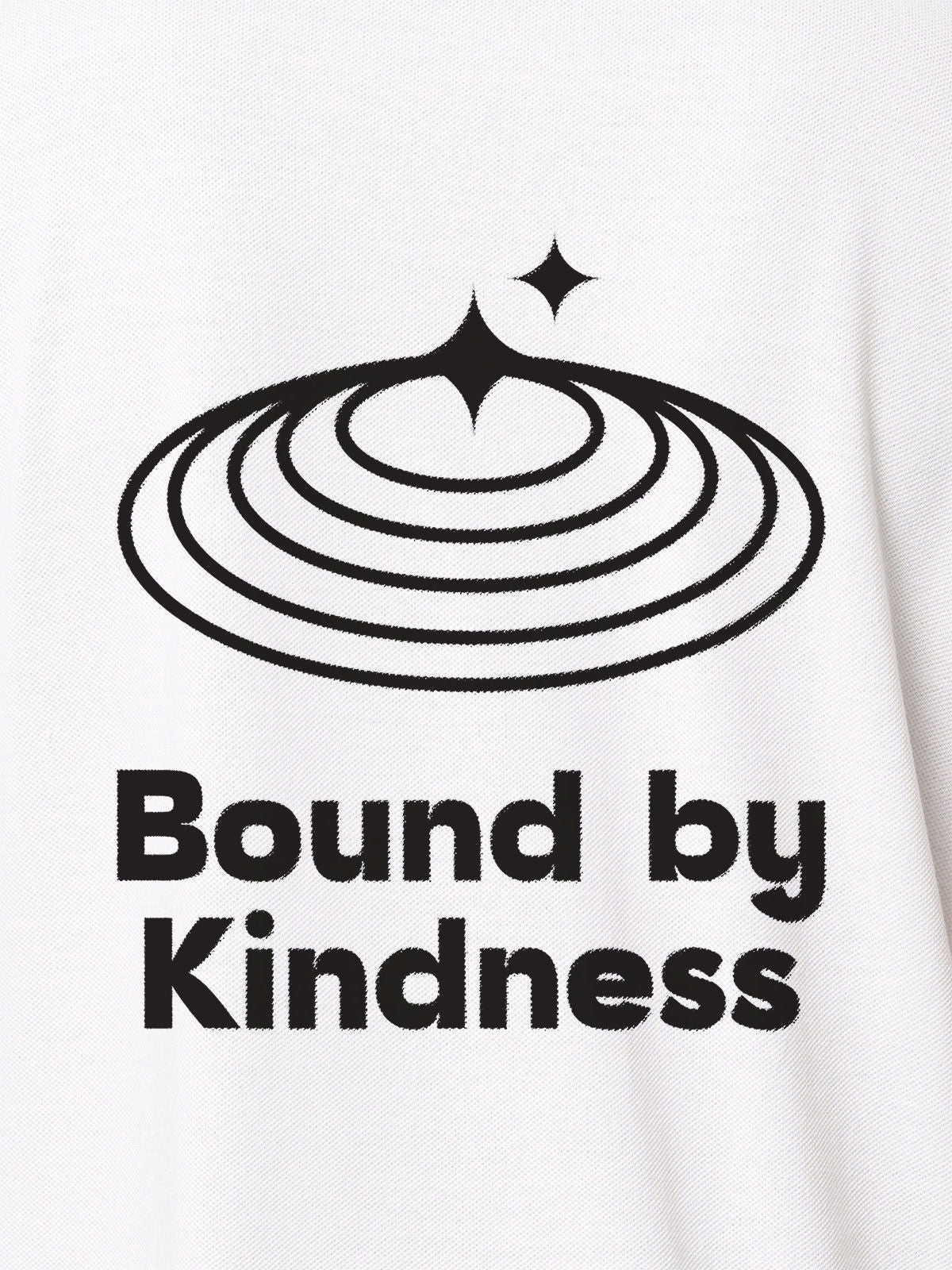 Close up of 'Bound By Kindness' design on Women's White Polo T-shirt, highlighting intricate details and vibrant print.