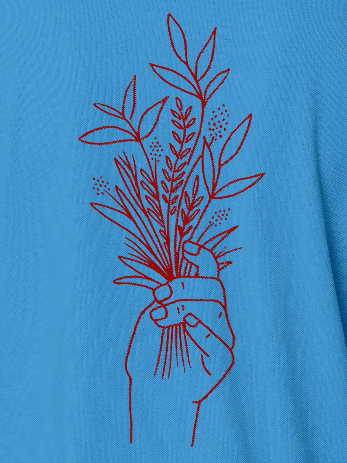 Close up of 'Love and Joy' design on Men's Blue Polo T-shirt, highlighting intricate details and vibrant print.