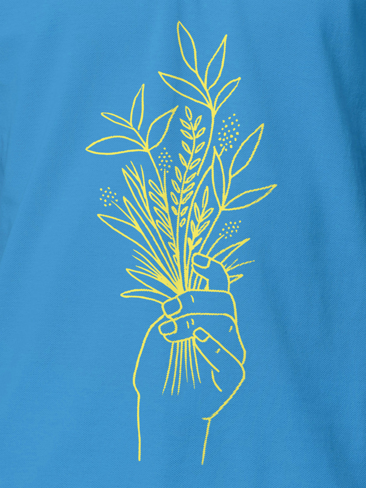 Close up of 'Love and Joy' design on Women's Blue Polo T-shirt, highlighting intricate details and vibrant print.
