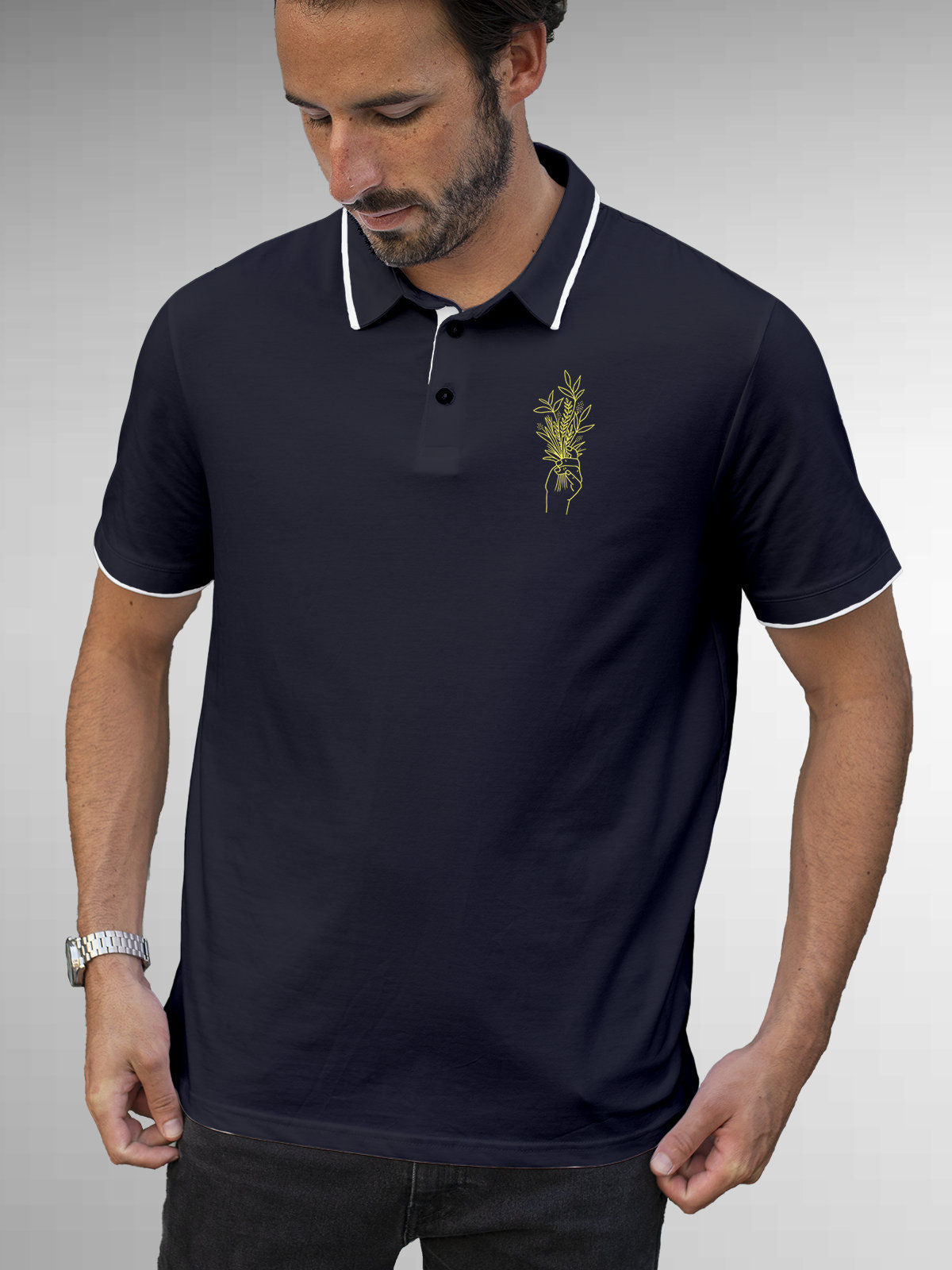 Model wearing Men's Navy Blue Polo T-shirt with 'Love and Joy' design, offering effortless style and premium comfort