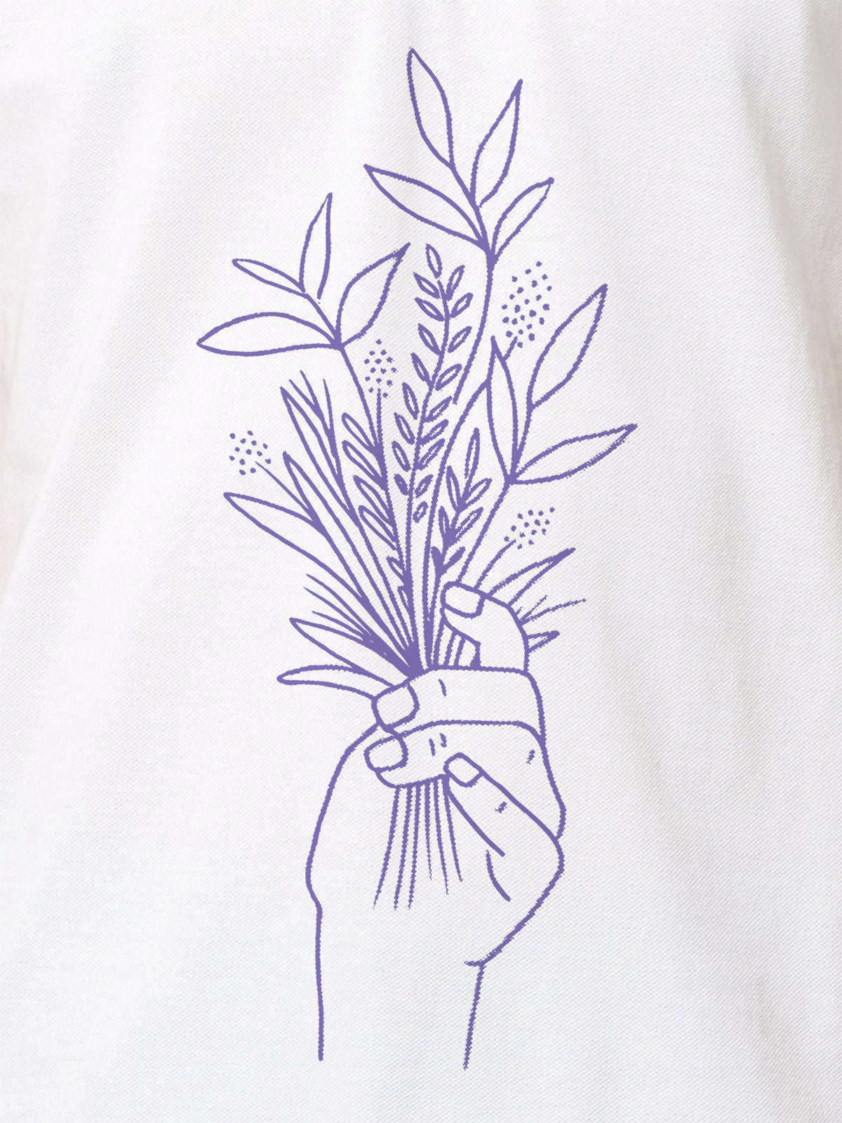 Close up of 'Love and Joy' design on Women's White Polo T-shirt, highlighting intricate details and vibrant print.