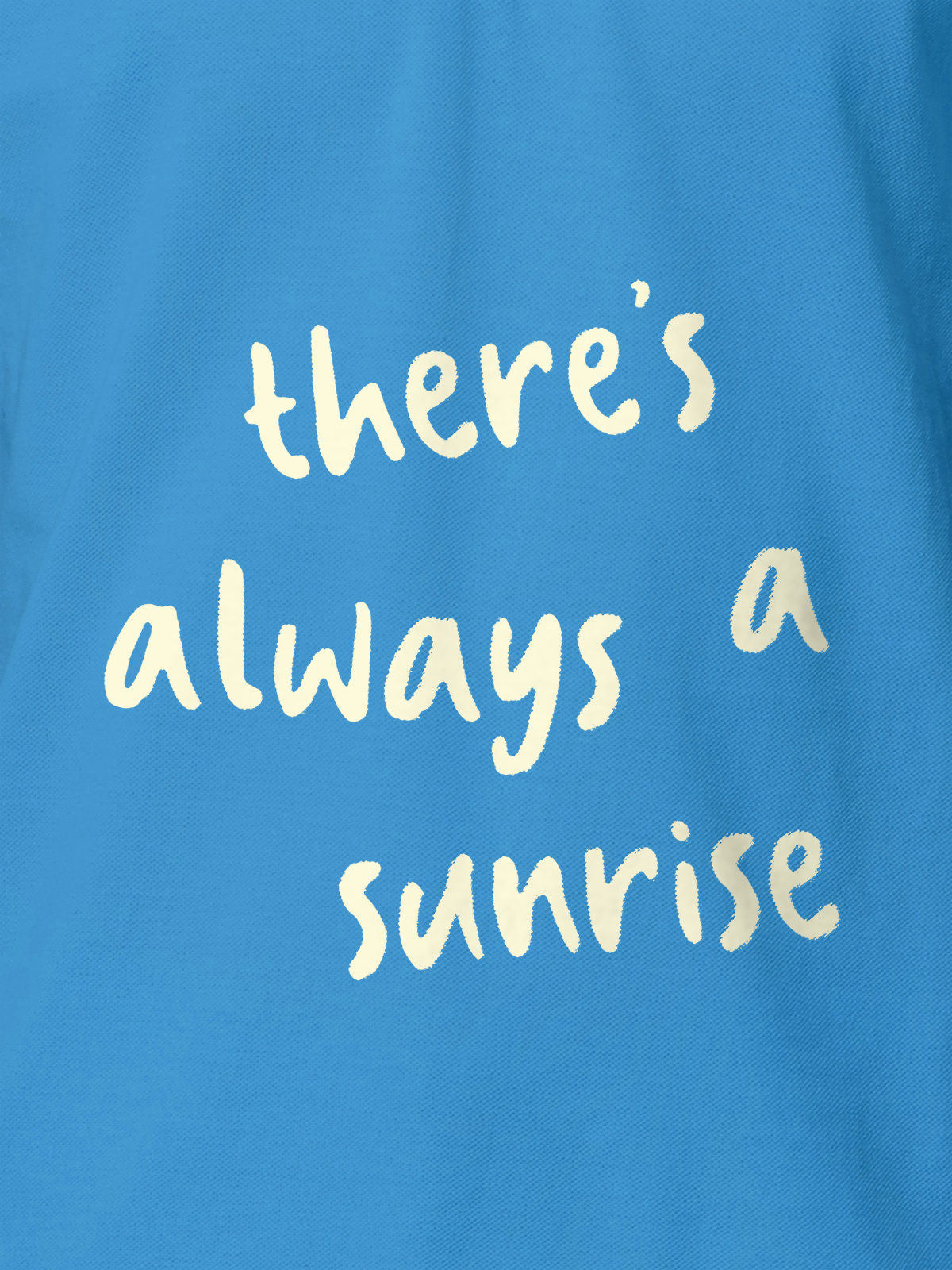 Close up of 'There's Always a Sunrise' design on Men's Blue Polo T-shirt, highlighting intricate details and vibrant print.