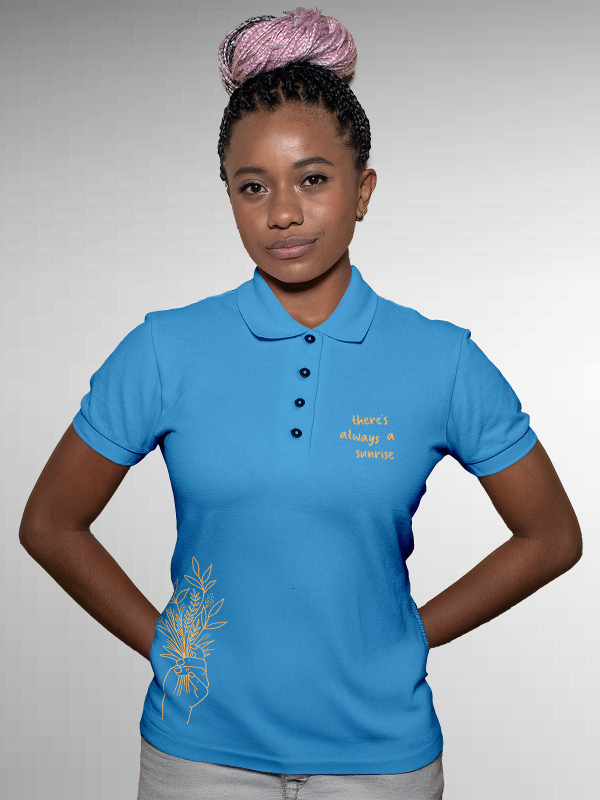 Model wearing Women's Blue Polo T-shirt with 'There's Always a Sunrise' design, offering effortless style and premium comfort