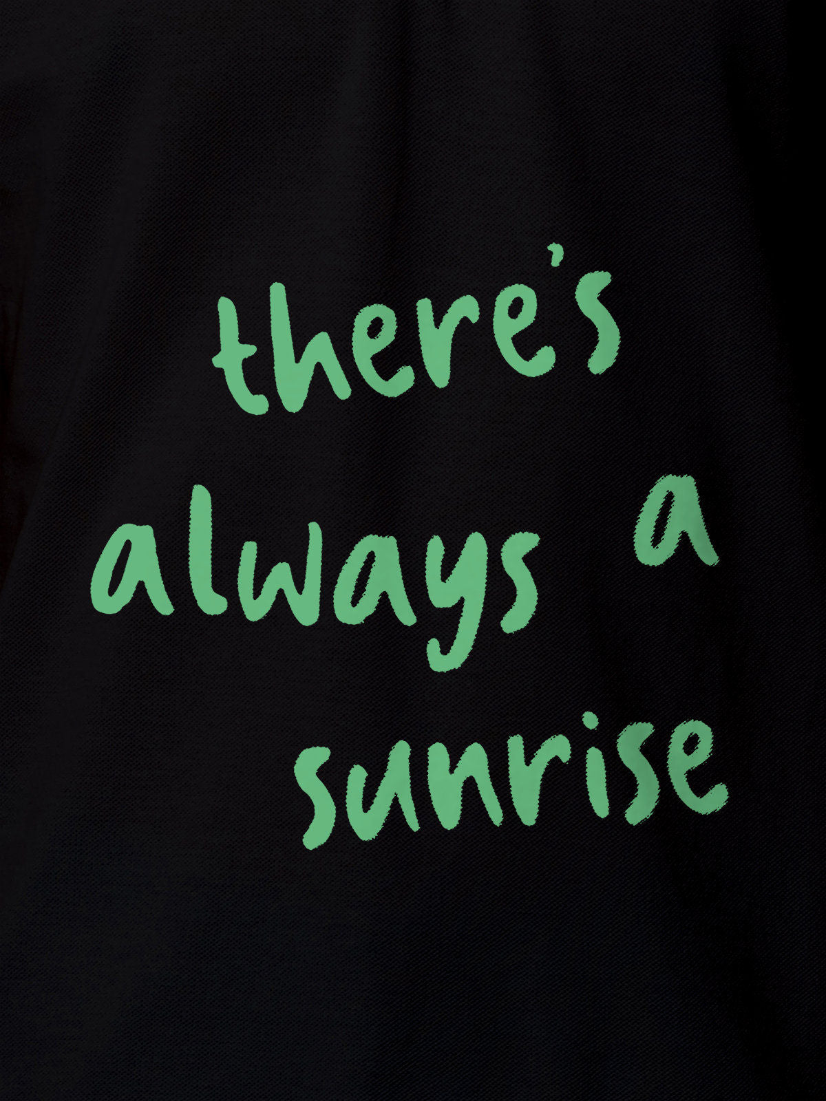 Close up of 'There's Always a Sunrise' design on Men's Black Polo T-shirt, highlighting intricate details and vibrant print.