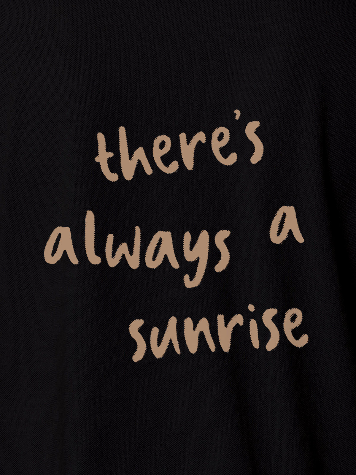 Close up of 'There's Always a Sunrise' design on Women's Black Polo T-shirt, highlighting intricate details and vibrant print.