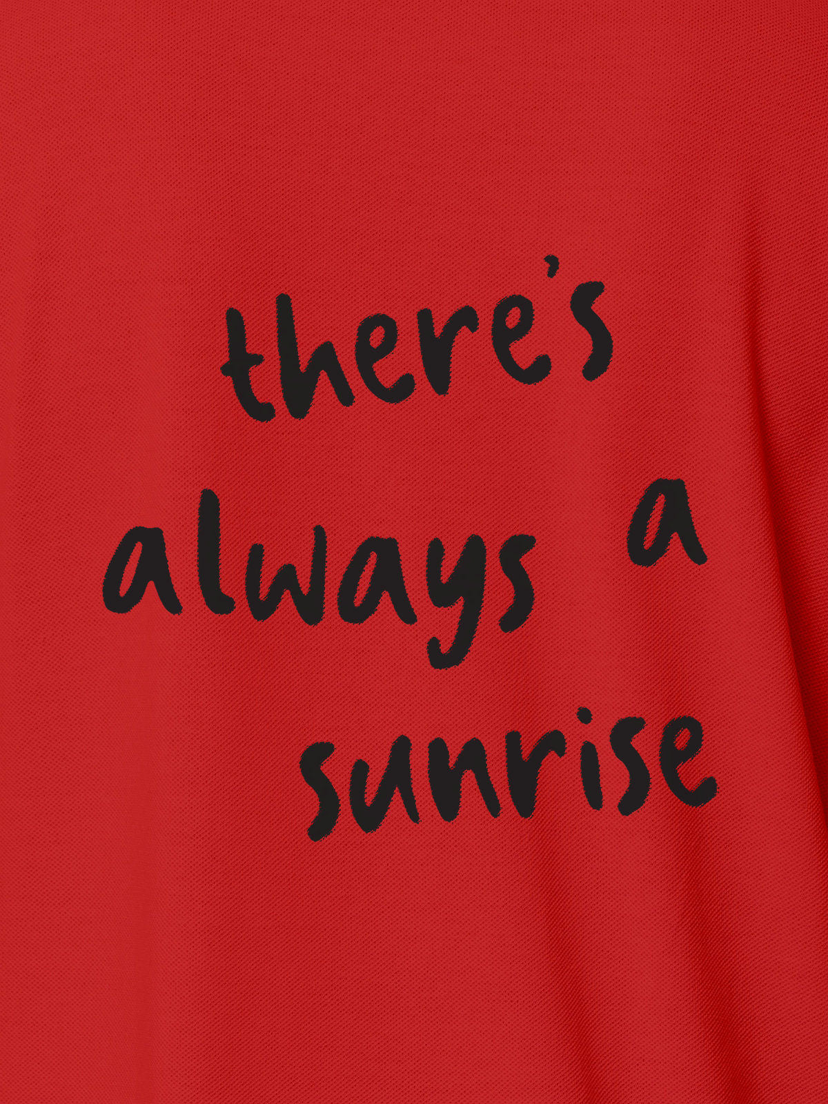 Close up of 'There's Always a Sunrise' design on Women's Red Polo T-shirt, highlighting intricate details and vibrant print.