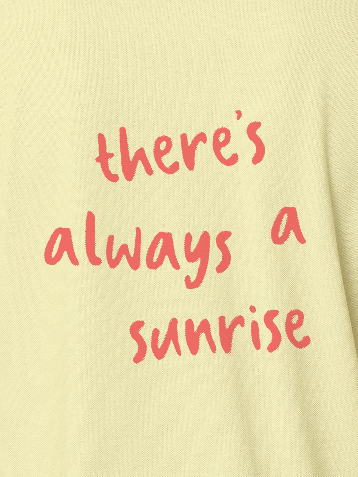 Close up of 'There's Always a Sunrise' design on Women's Yellow Polo T-shirt, highlighting intricate details and vibrant print.